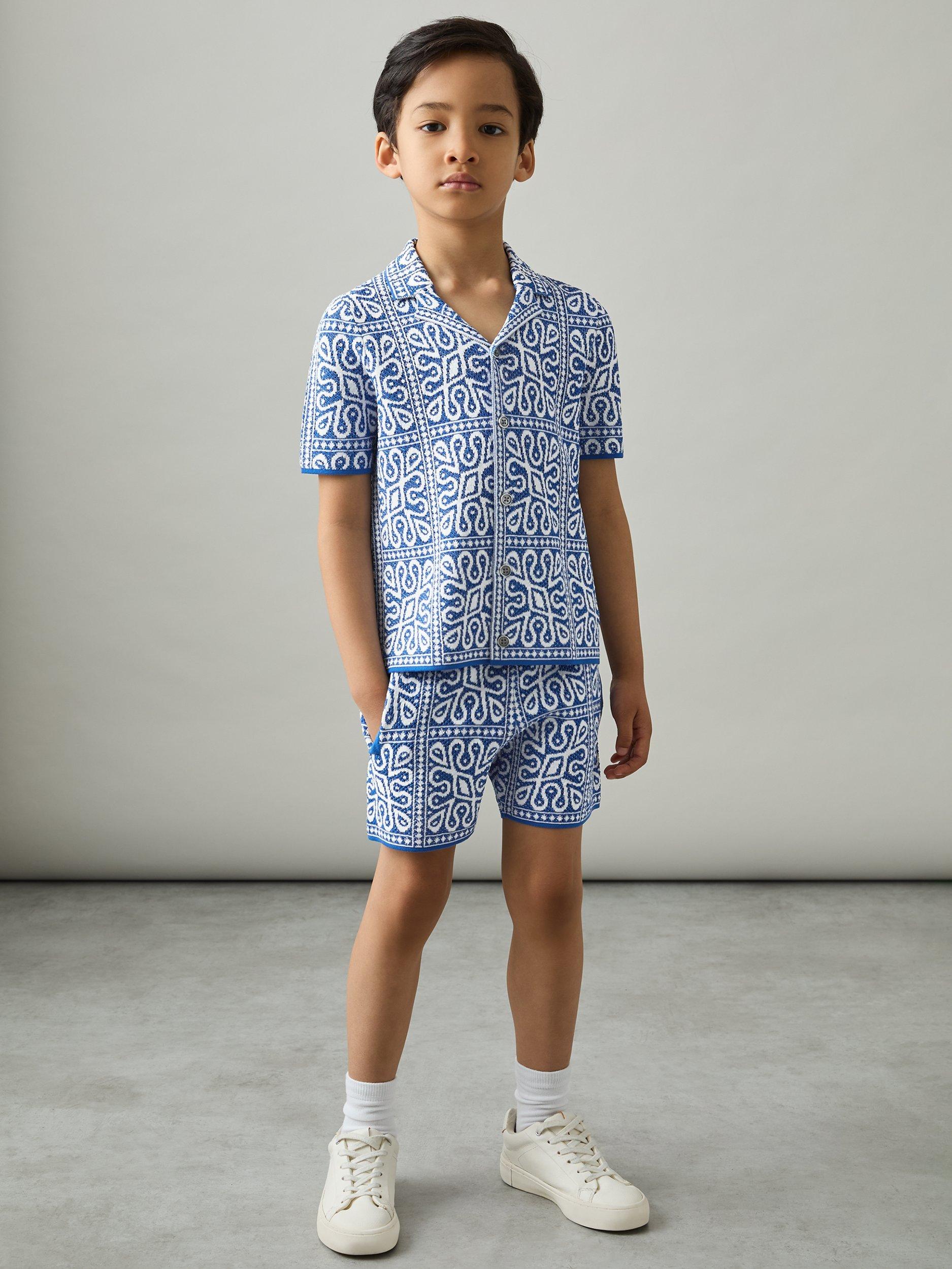 Product image 3 of 4, which shows Reiss Kids' Redhill Tile Print Knitted Shorts, Blue/White, 4-5 years