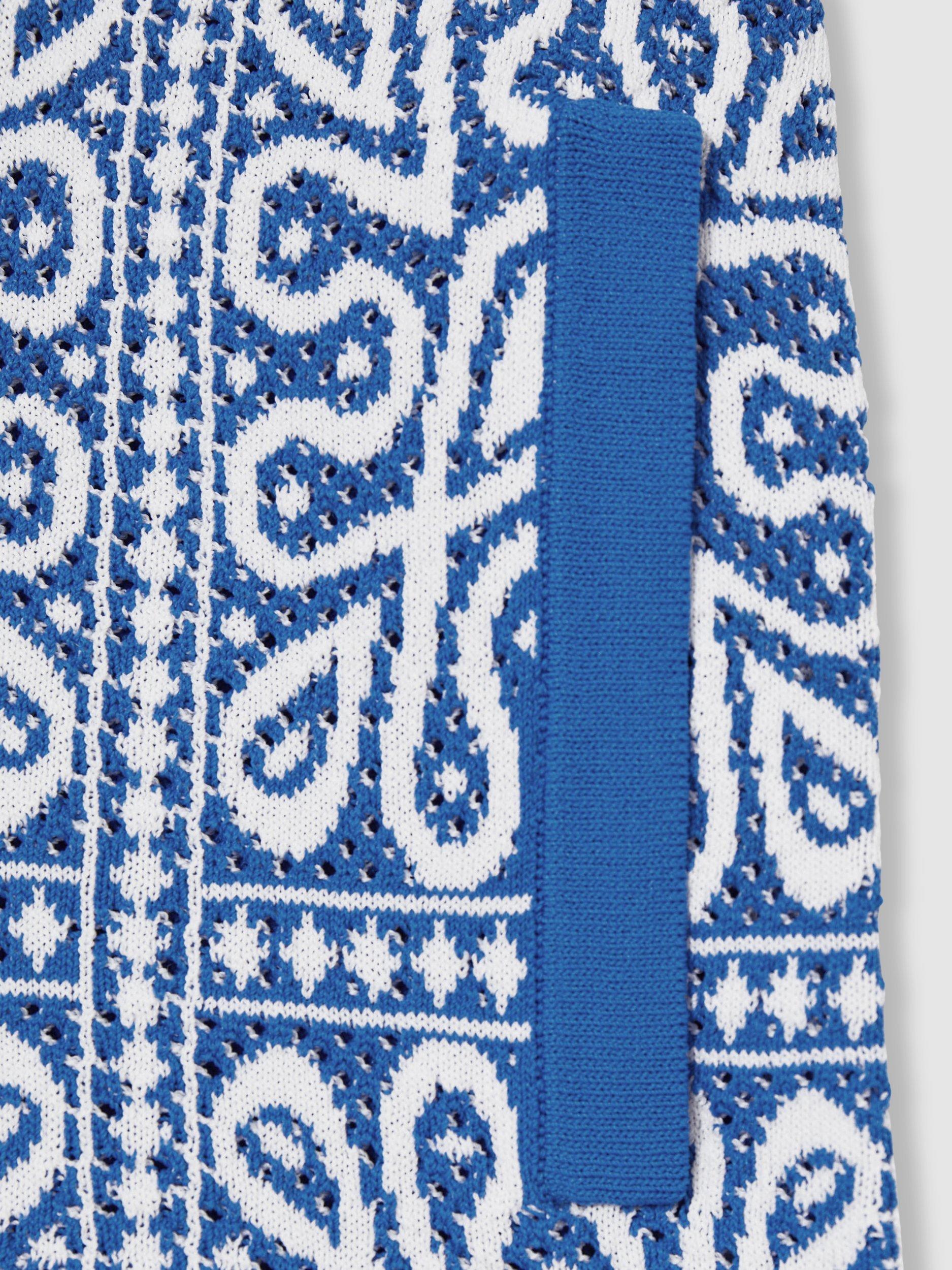 Product image 4 of 4, which shows Reiss Kids' Redhill Tile Print Knitted Shorts, Blue/White, 4-5 years