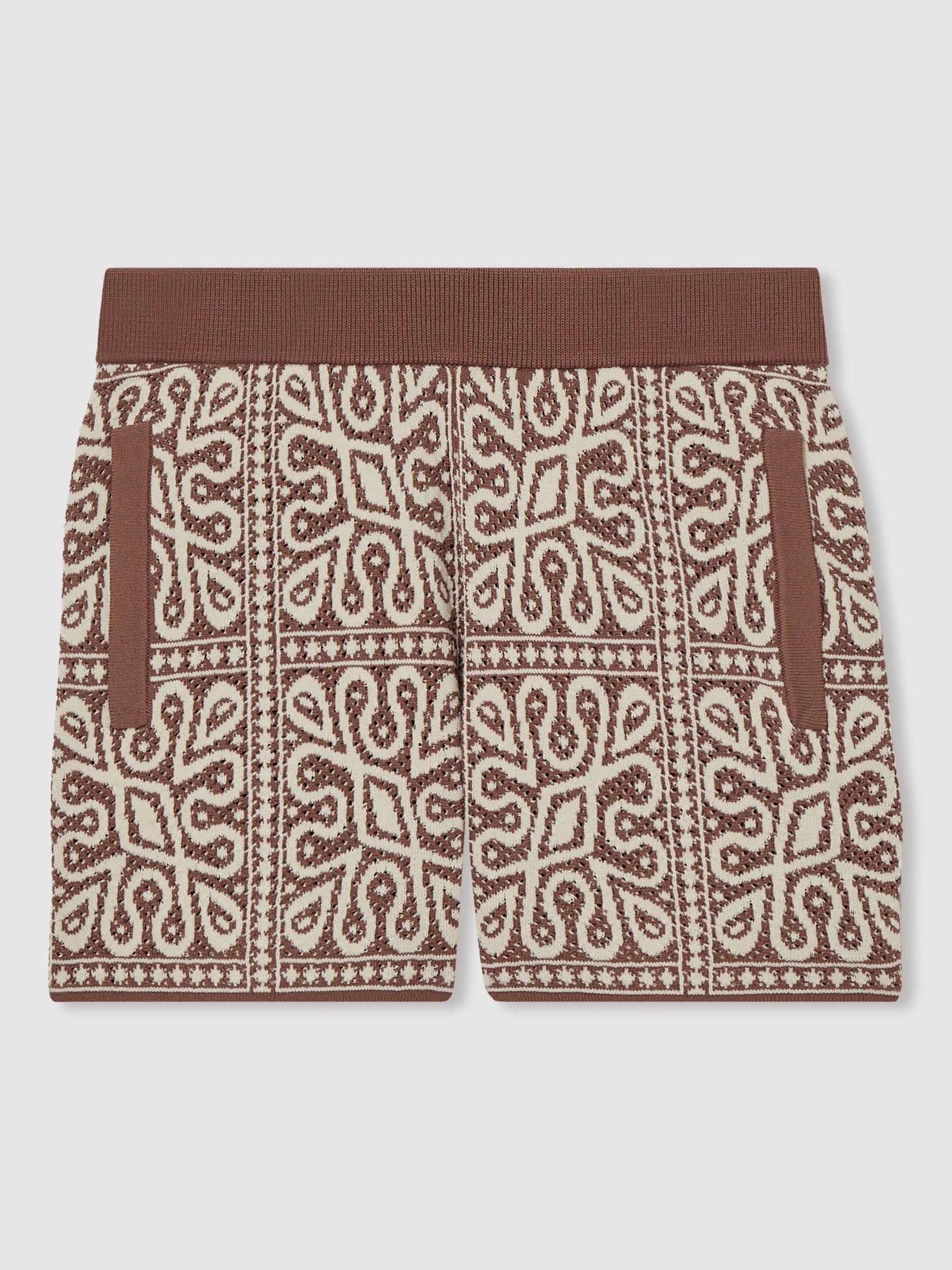 Product image 1 of 4, which shows Reiss Kids' Redhill Tile Print Knitted Shorts, Brown/Off White, 5-6 years