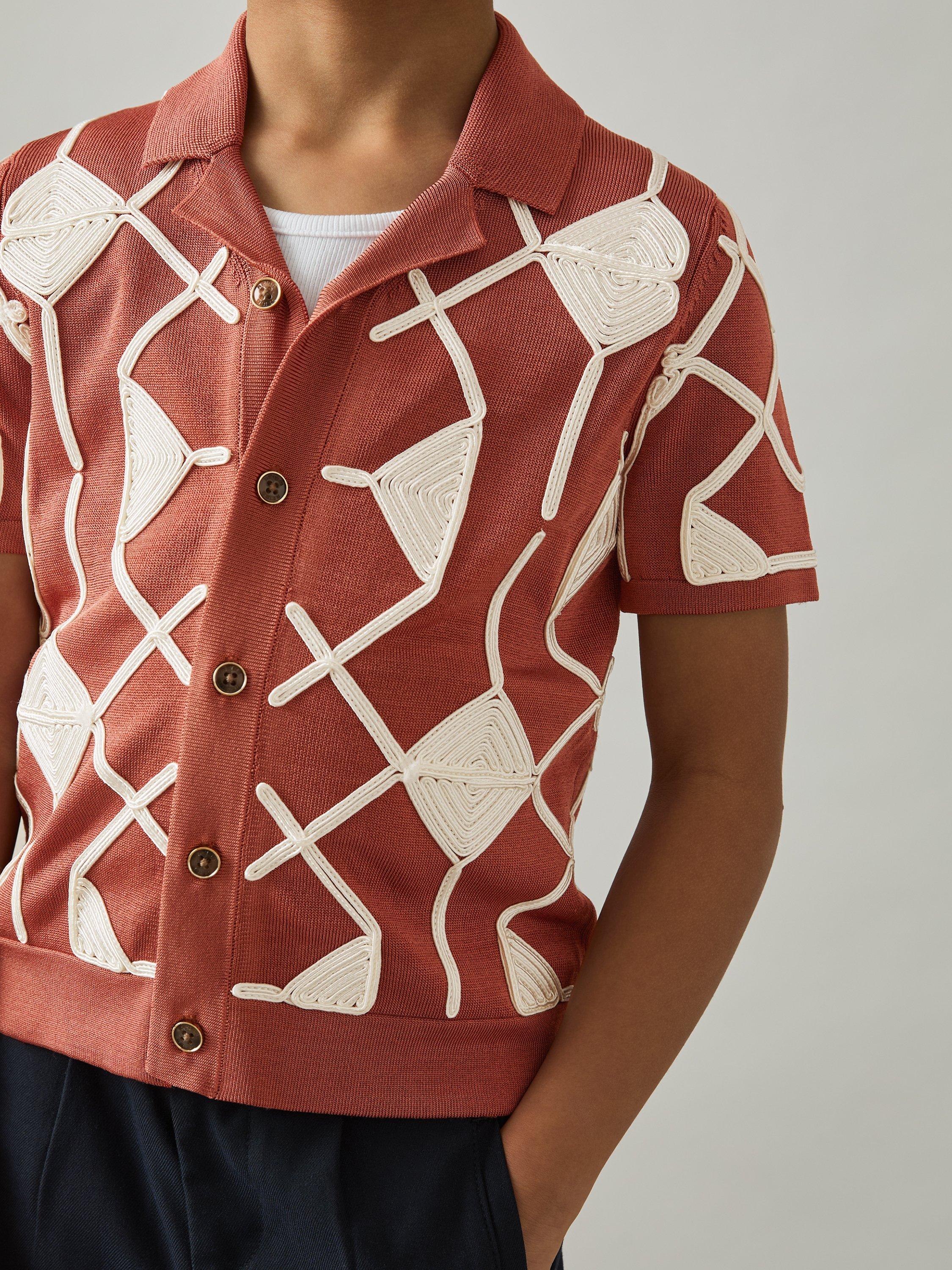 Product image 2 of 4, which shows Reiss Kids' Terrazzo Geometric Shirt, Paprika/Off White, 3-4 years