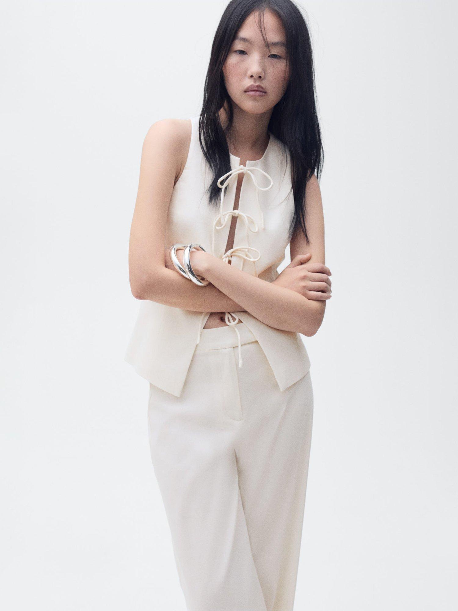 Product image 1 of 7, which shows Mango Ana Sleeveless Tie Front Top, Light Beige, S