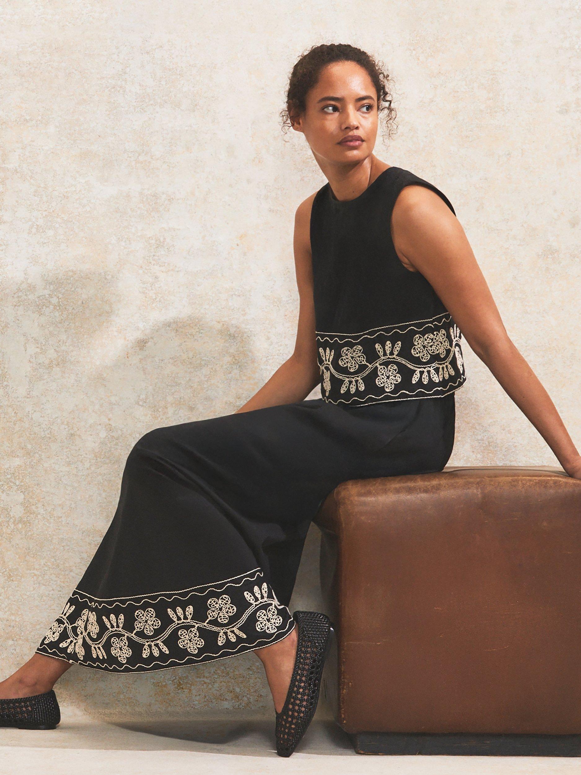 Product image 1 of 4, which shows Ro&Zo Embroidered Hem Shell Top, Black/Multi, 6