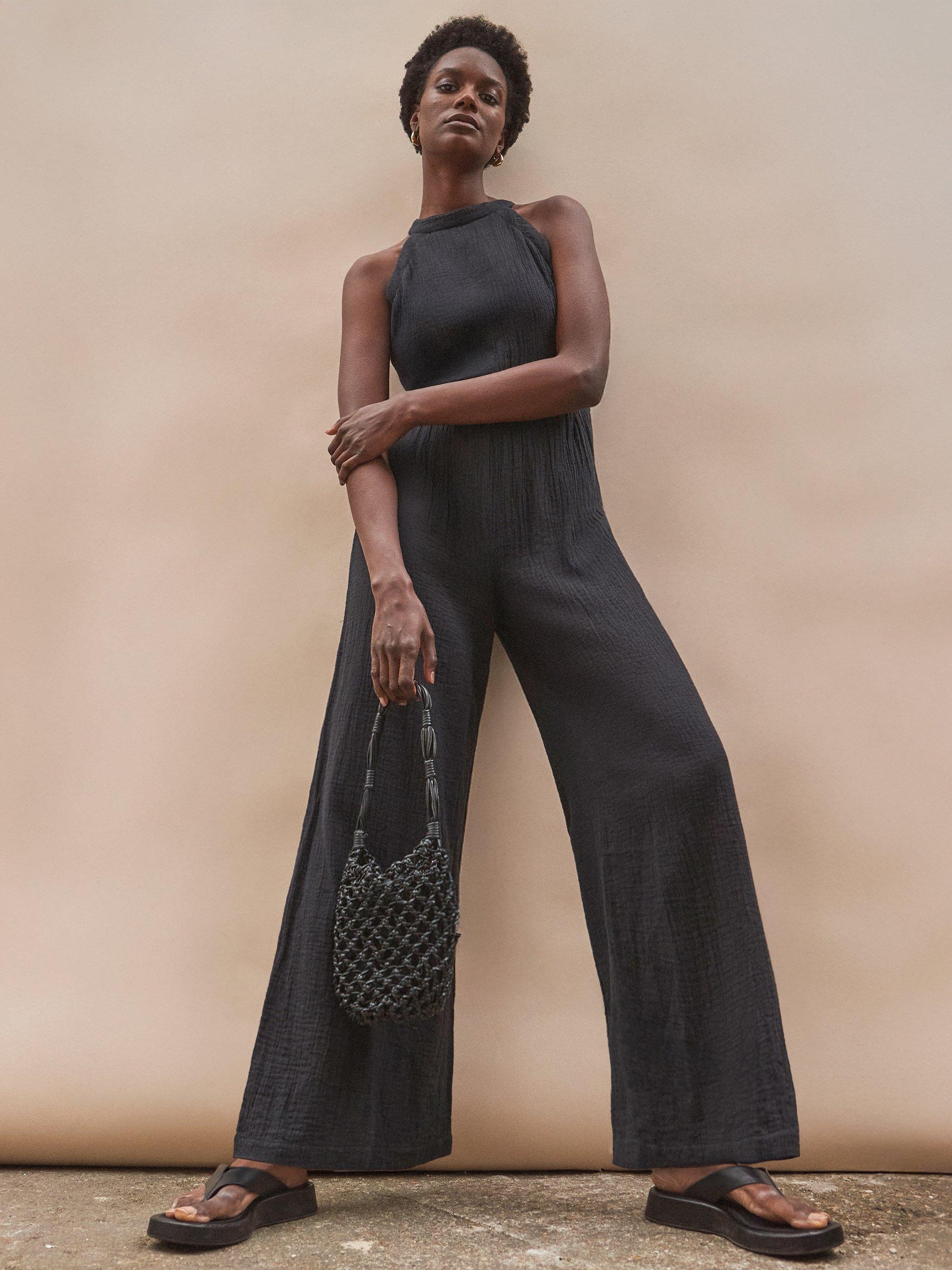 Product image 1 of 4, which shows Ro&Zo Cotton Shirred Halterneck Jumpsuit, Black, 10