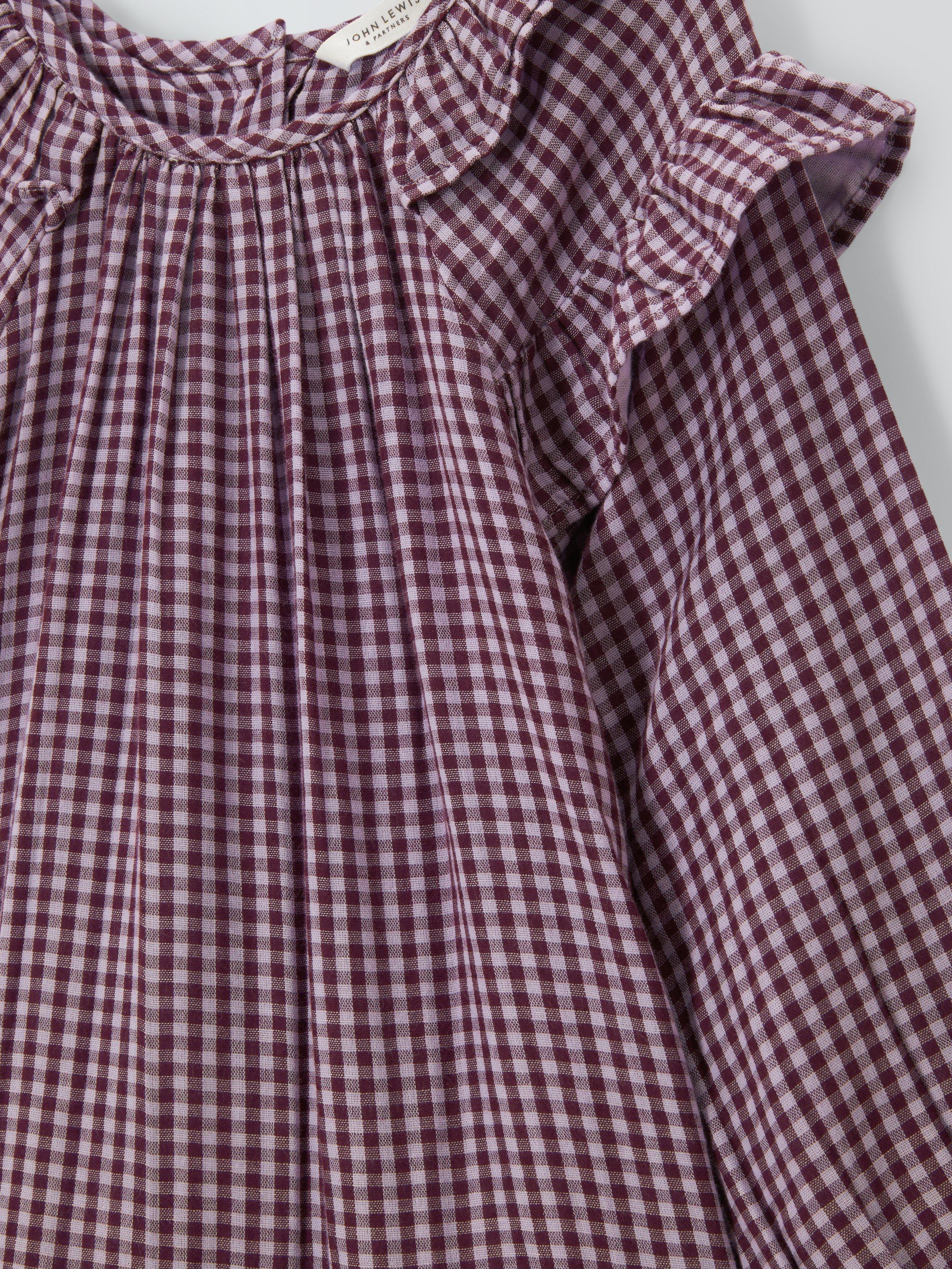 Product image 5 of 7, which shows John Lewis Kids' Cotton Check Ruffle Dress, Orange, Black, 3 years
