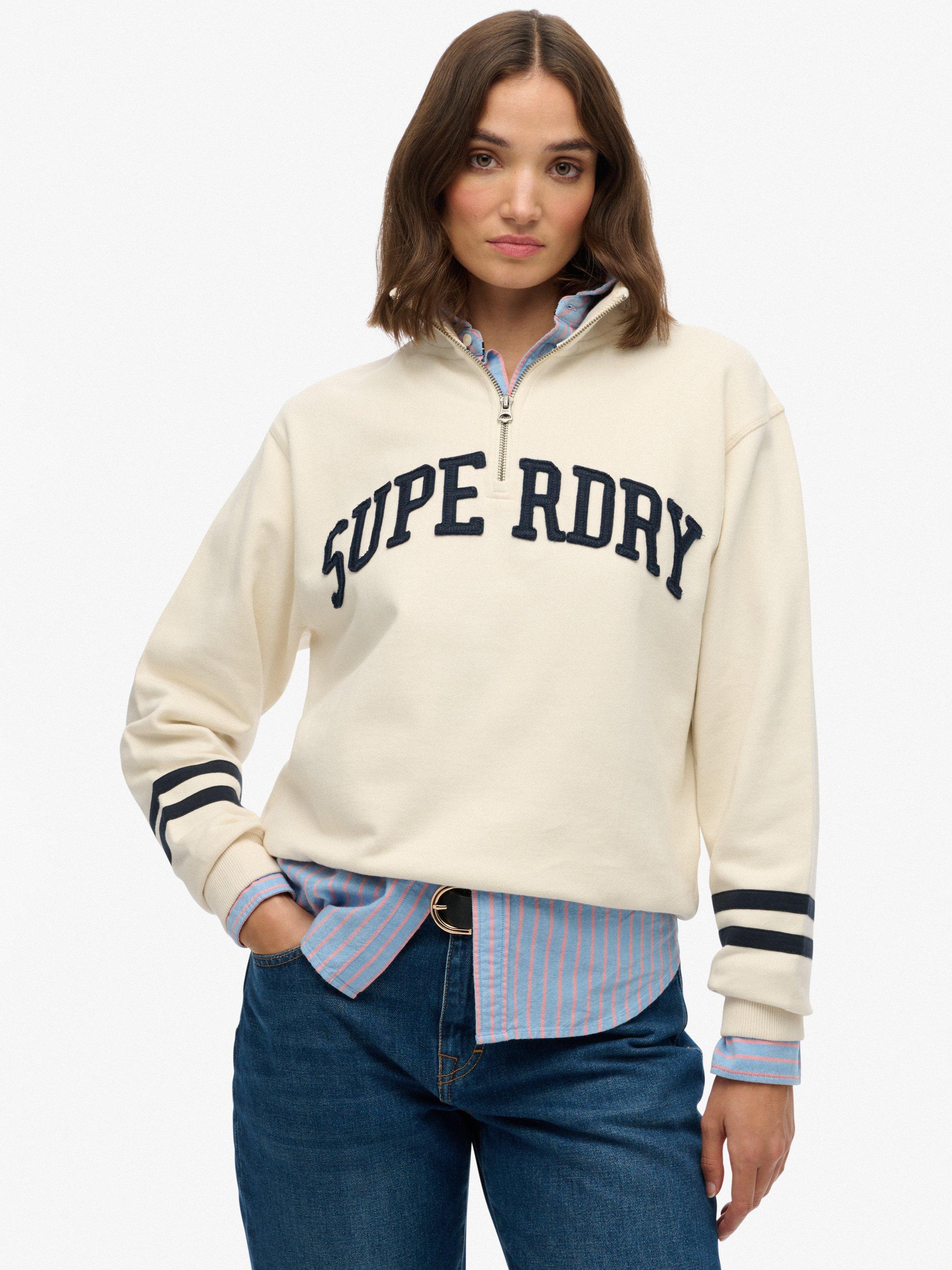 Product image 1 of 5, which shows Superdry Athletic Essentials Applique 1/2 Zip Sweatshirt, Desert Bone White, 10