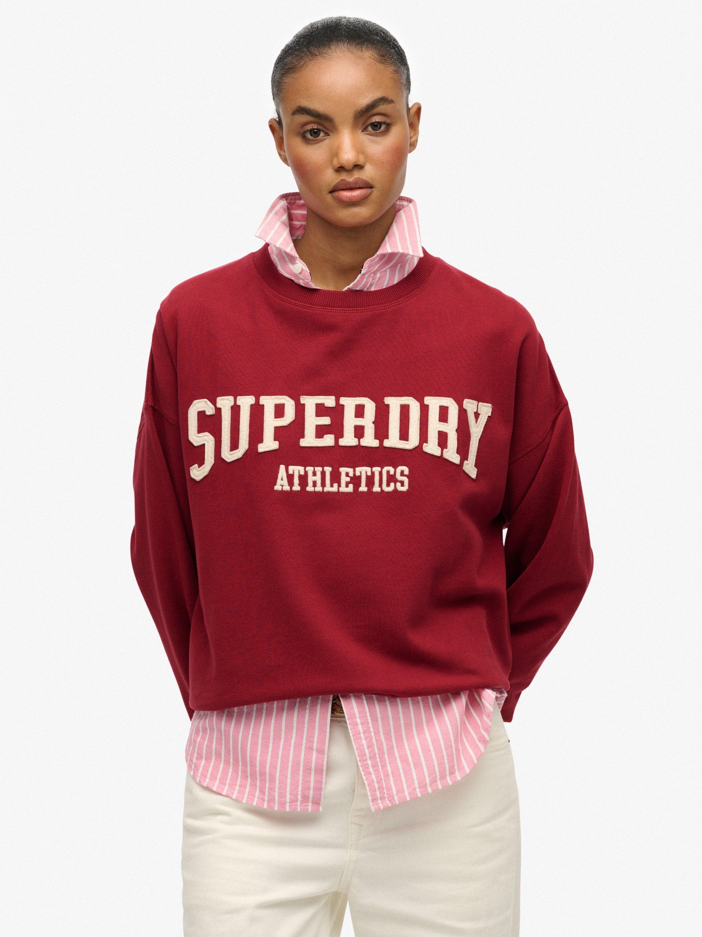 Product image 1 of 6, which shows Superdry Athletic Essentials Relaxed Applique Sweatshirt, Bordeaux Red, 10