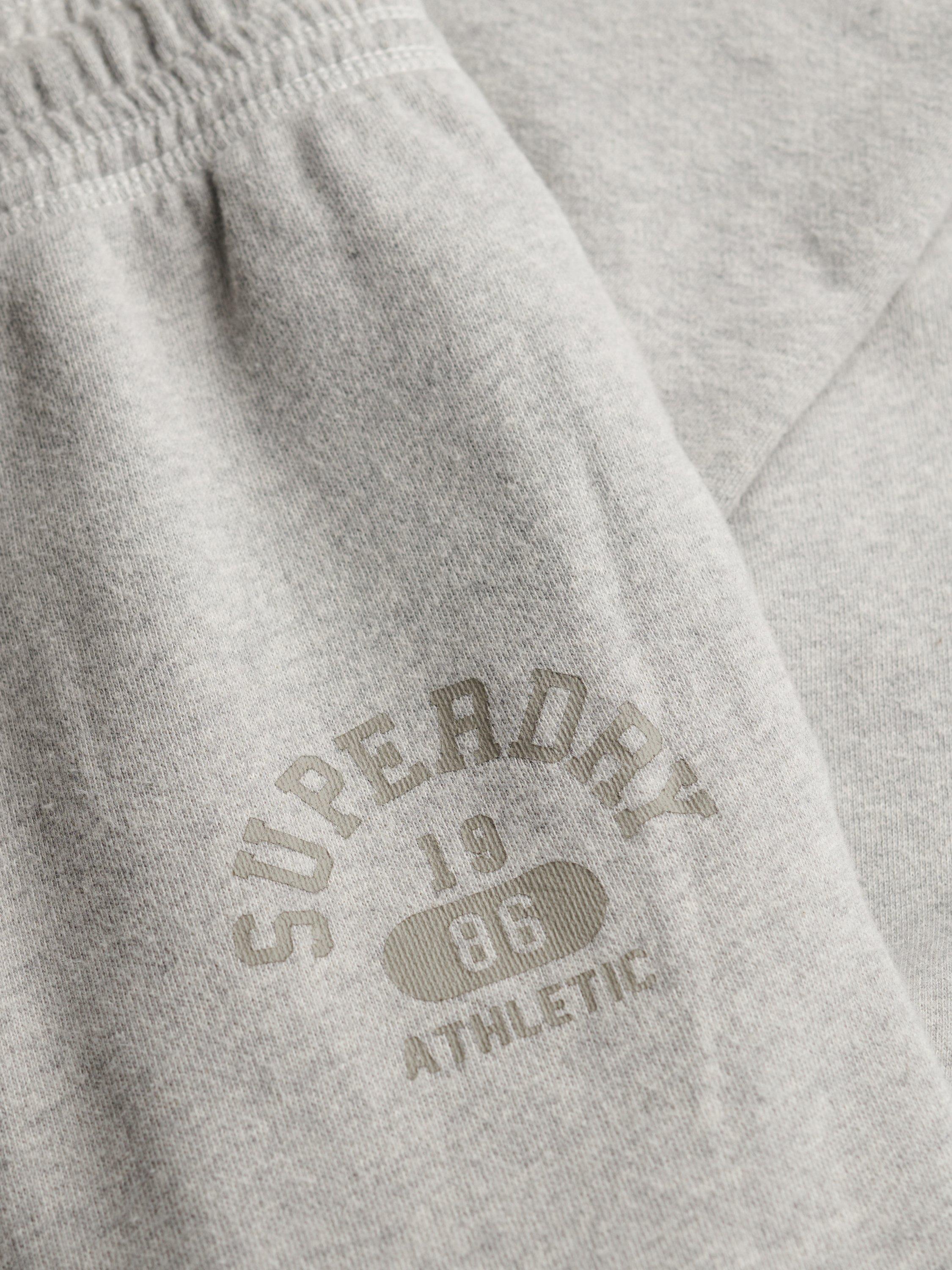 Product image 6 of 7, which shows Superdry Athletic Essentials Low Rise Flare Joggers, Grey Marl, 10