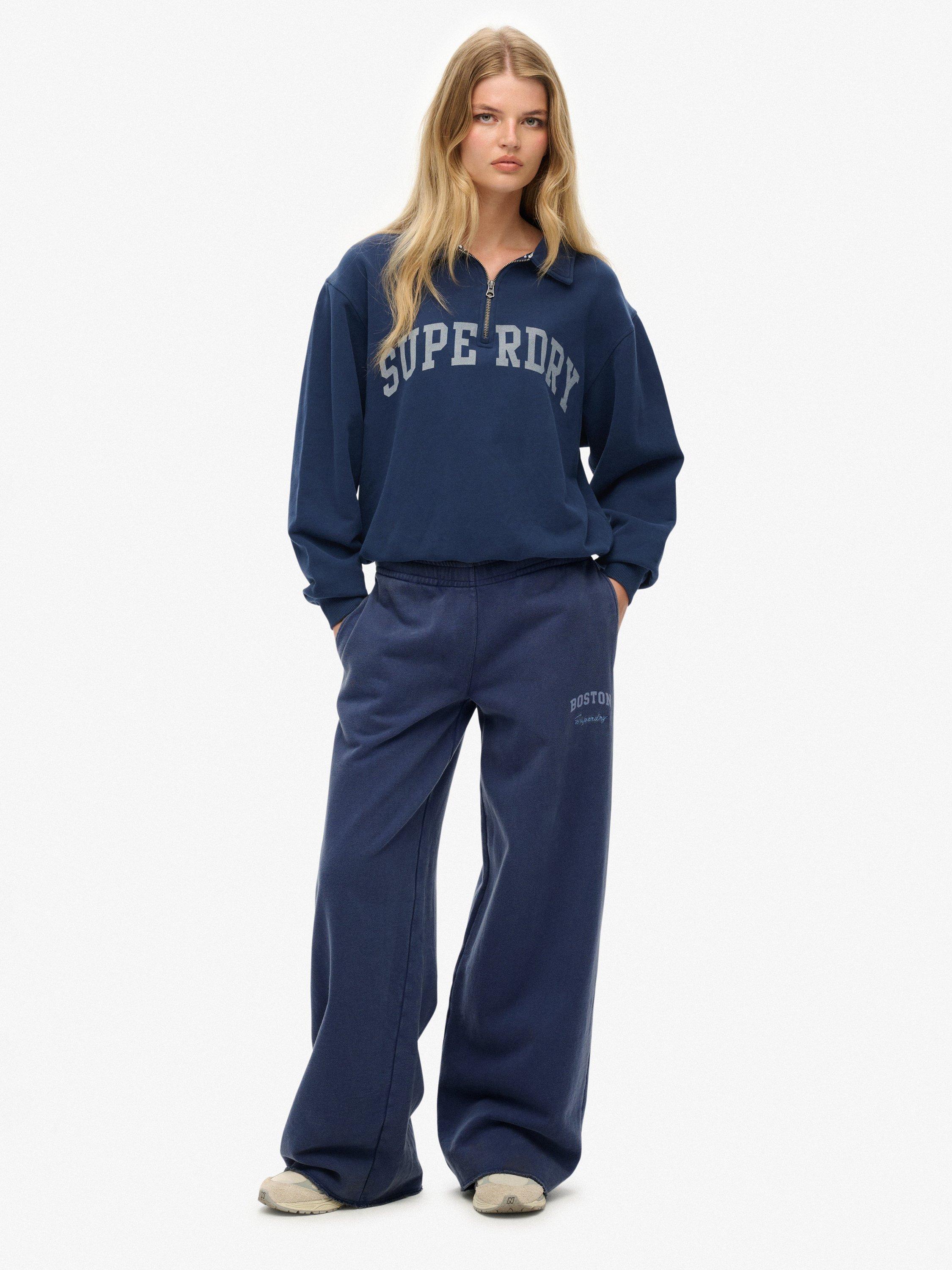Product image 1 of 7, which shows Superdry Athletic Essentials Low Rise Flare Joggers, Mariner Navy, 10