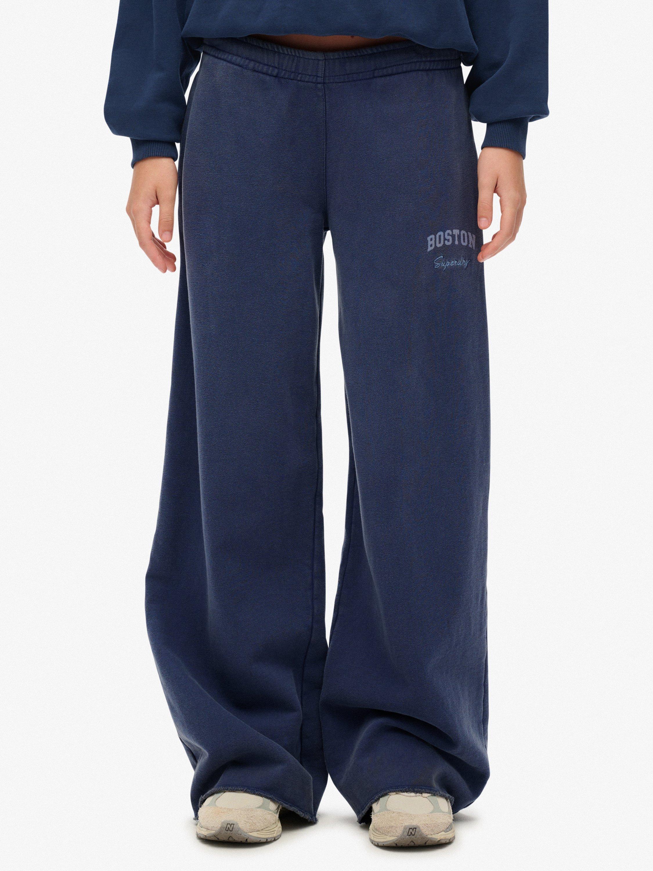 Product image 2 of 7, which shows Superdry Athletic Essentials Low Rise Flare Joggers, Mariner Navy, 10
