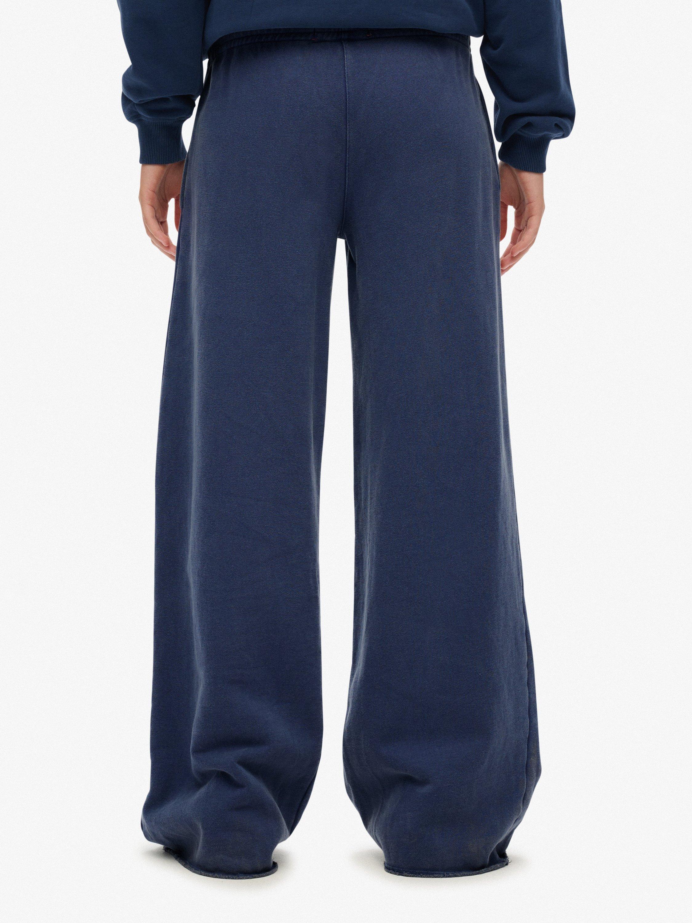 Product image 4 of 7, which shows Superdry Athletic Essentials Low Rise Flare Joggers, Mariner Navy, 10