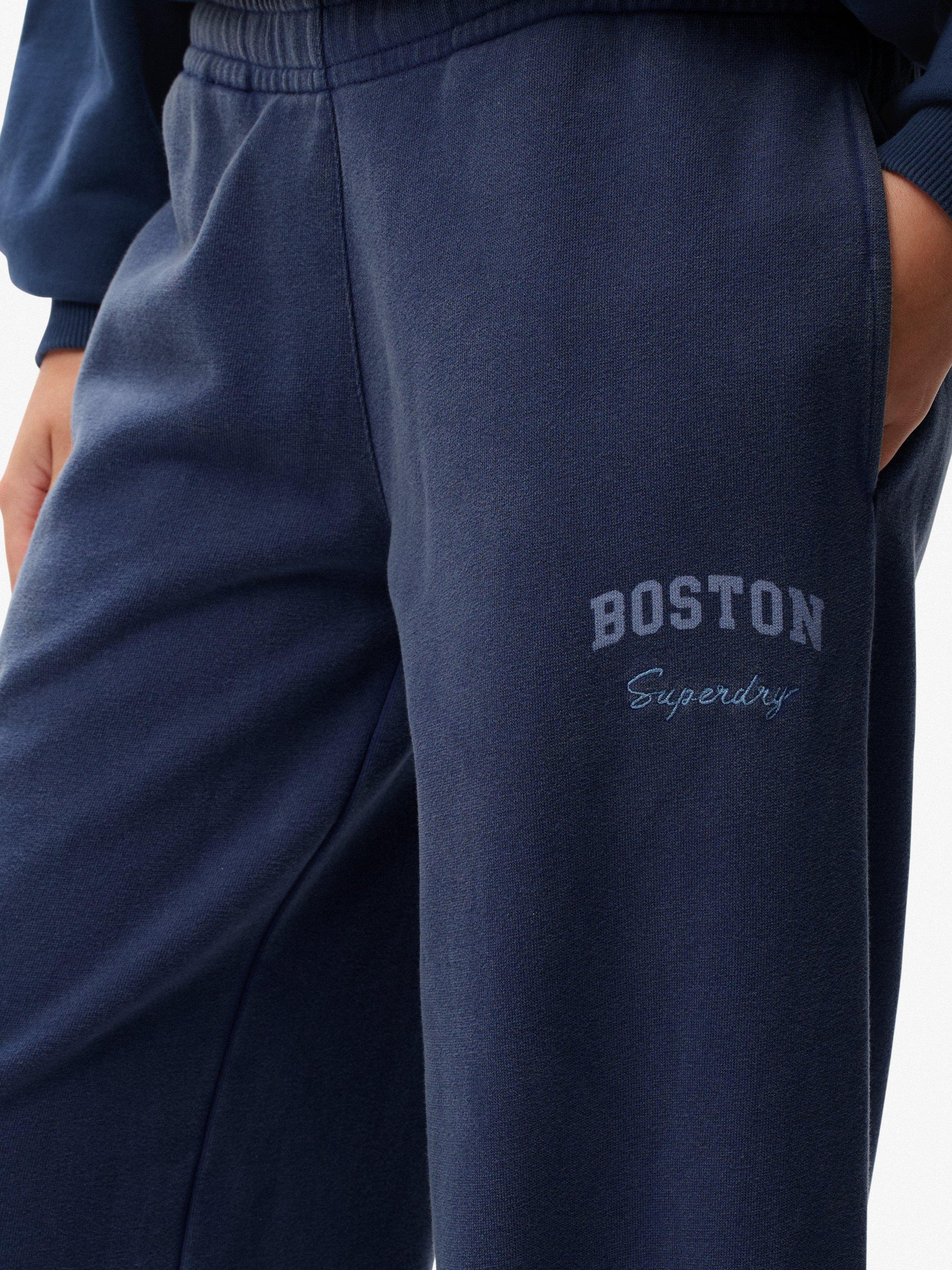 Product image 6 of 7, which shows Superdry Athletic Essentials Low Rise Flare Joggers, Mariner Navy, 10