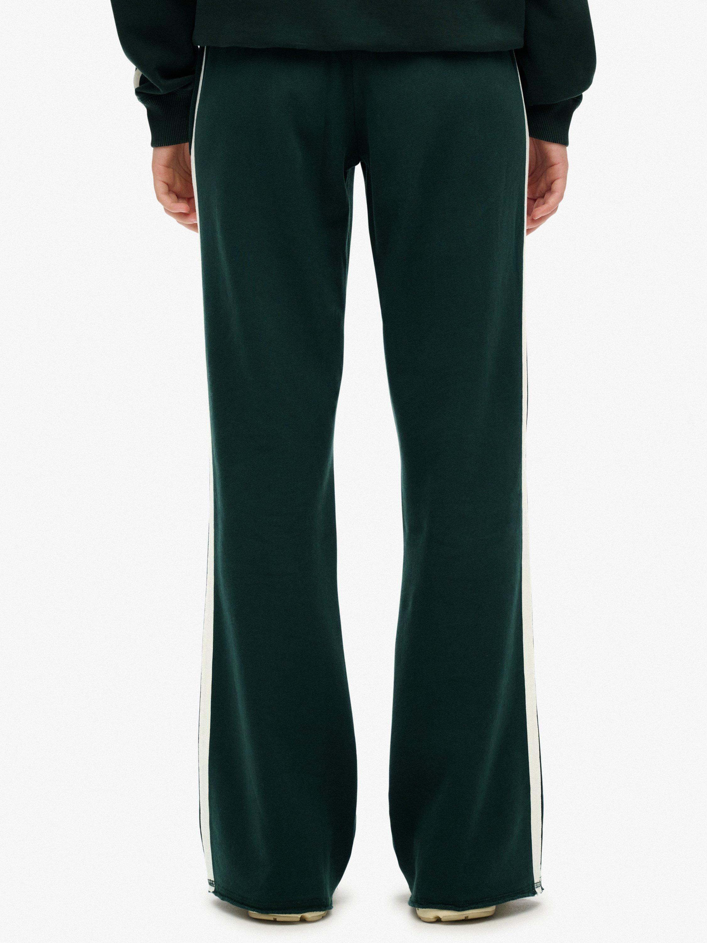 Product image 4 of 6, which shows Superdry Athletic Stripe Flare Joggers, Enamel Green, 10