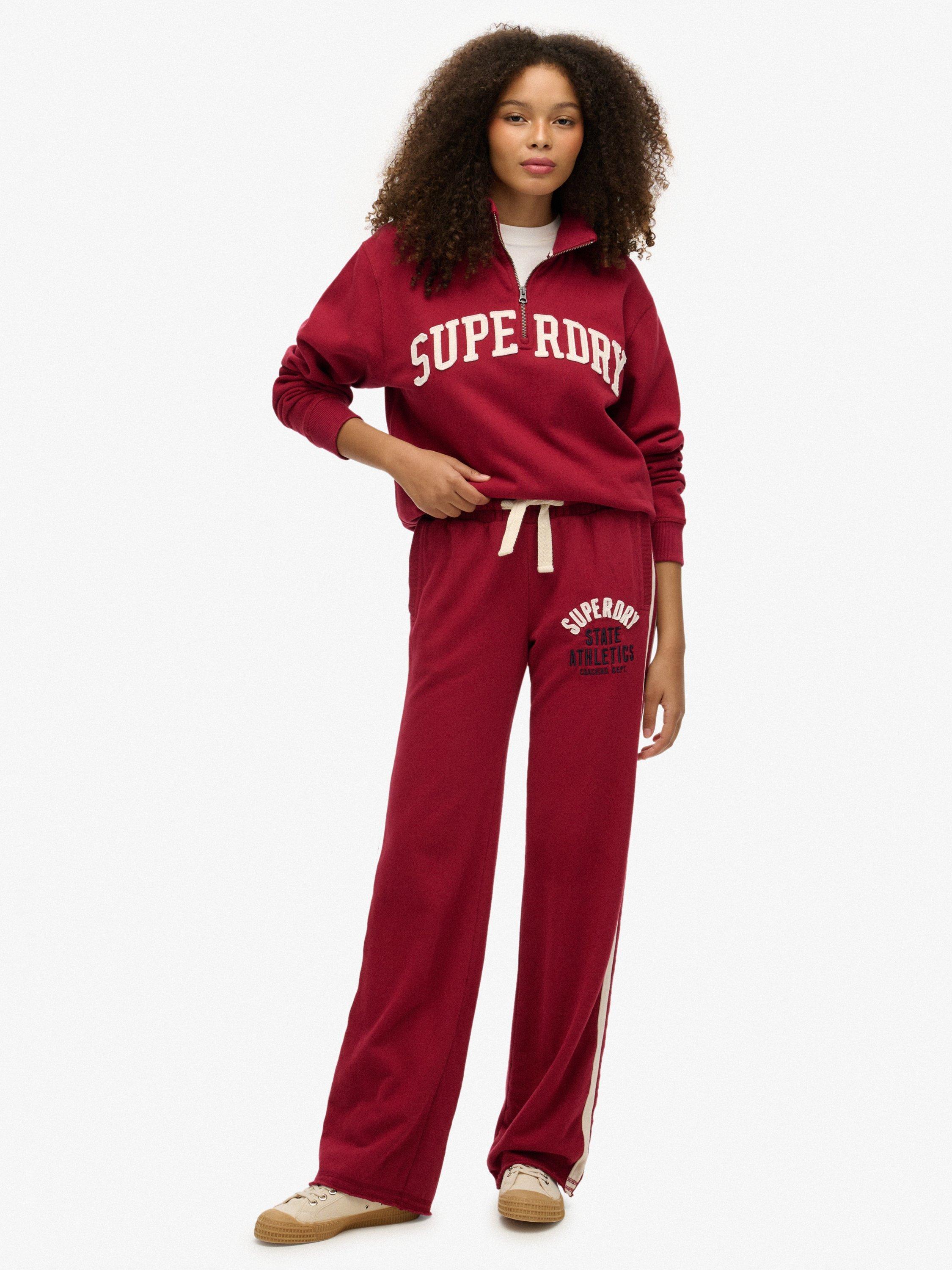 Product image 1 of 6, which shows Superdry Athletic Essentials Hockey Joggers, Bordeaux Red, 10