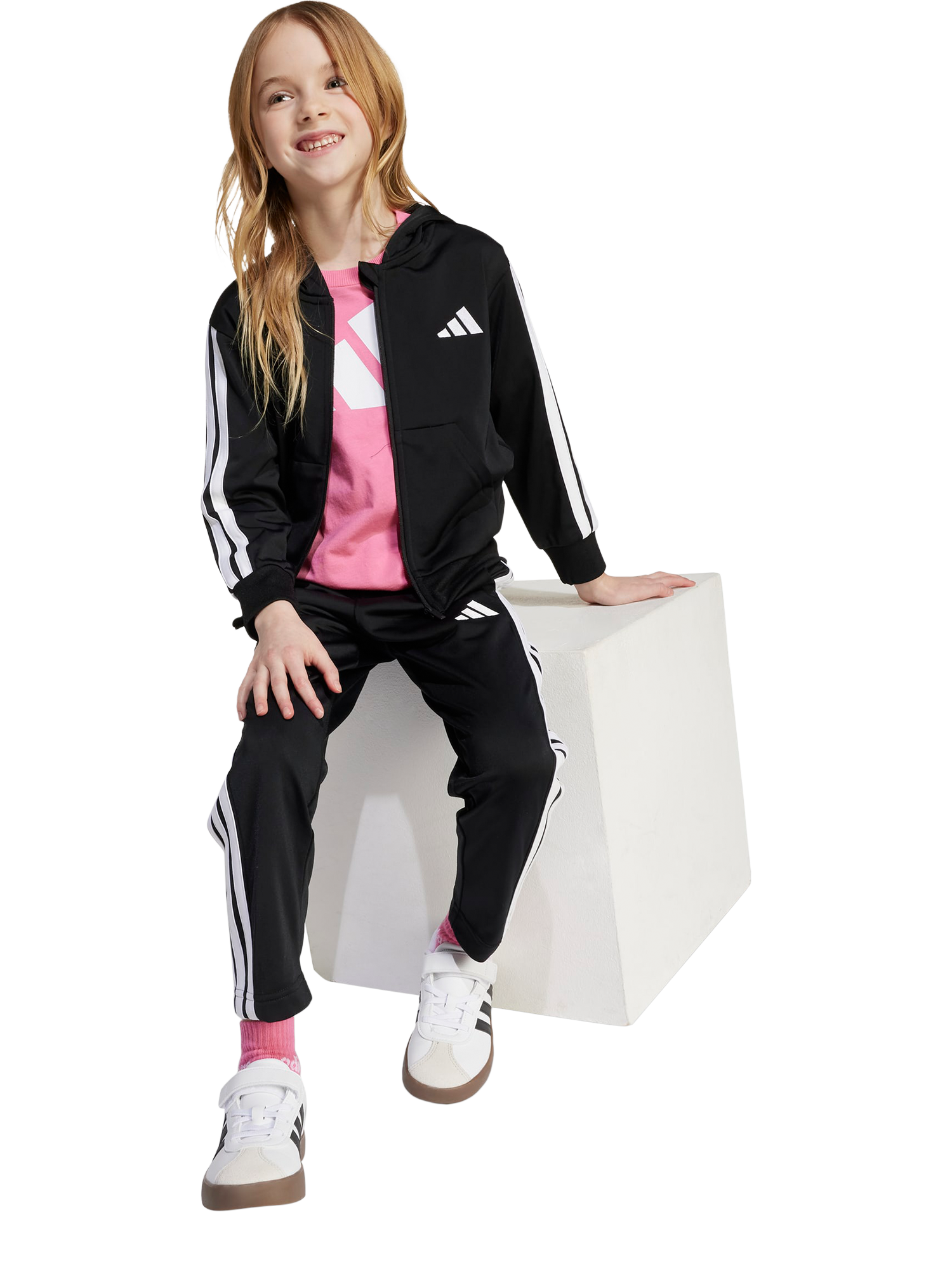 Product image 3 of 6, which shows adidas Kids' Essentials 3-Stripe Shiny Tracksuit, Black/White, 6-7 years