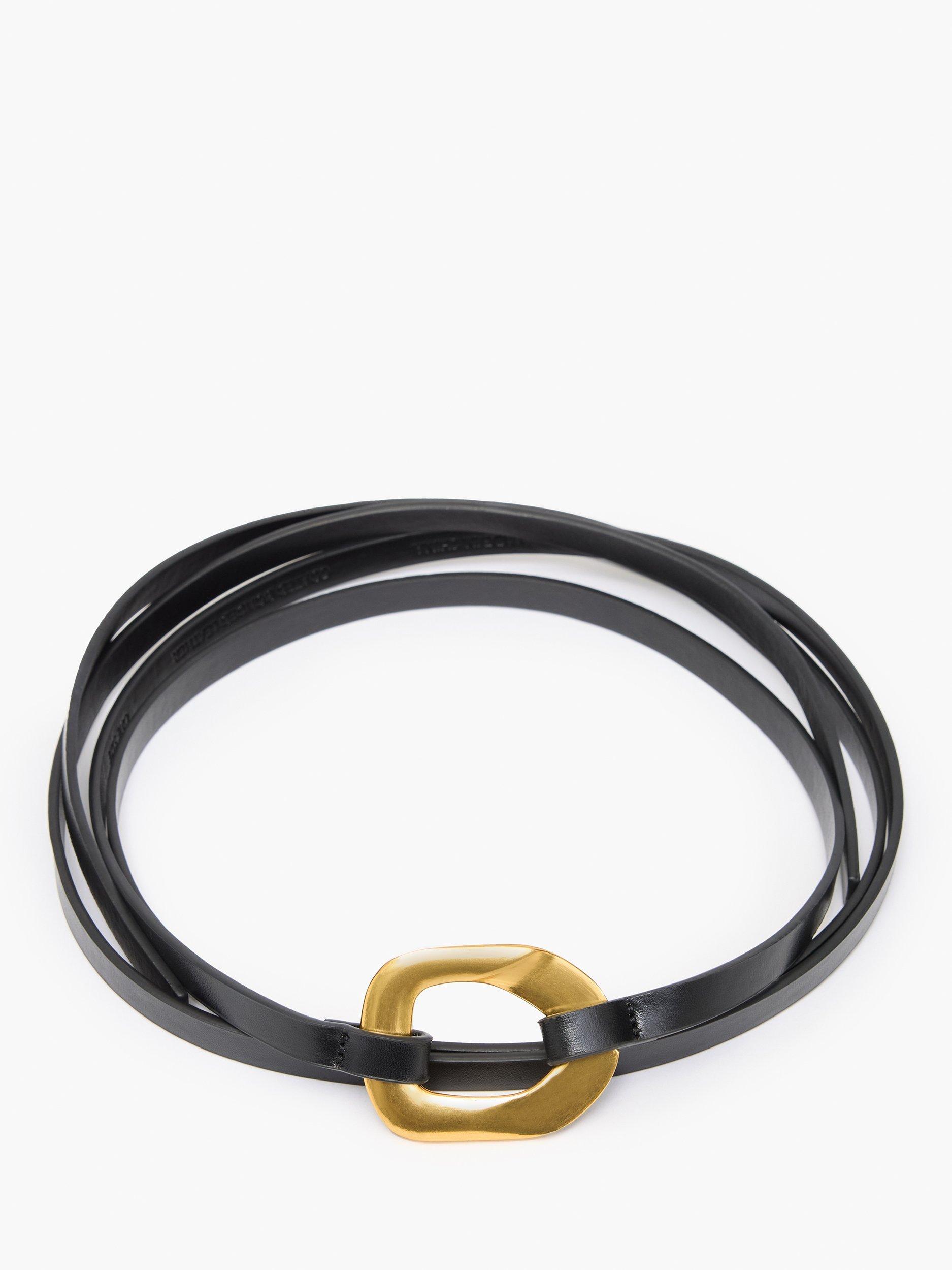 Product image 1 of 4, which shows French Connection Ornate Buckle Skinny Tie Belt, Black/Gold, One Size