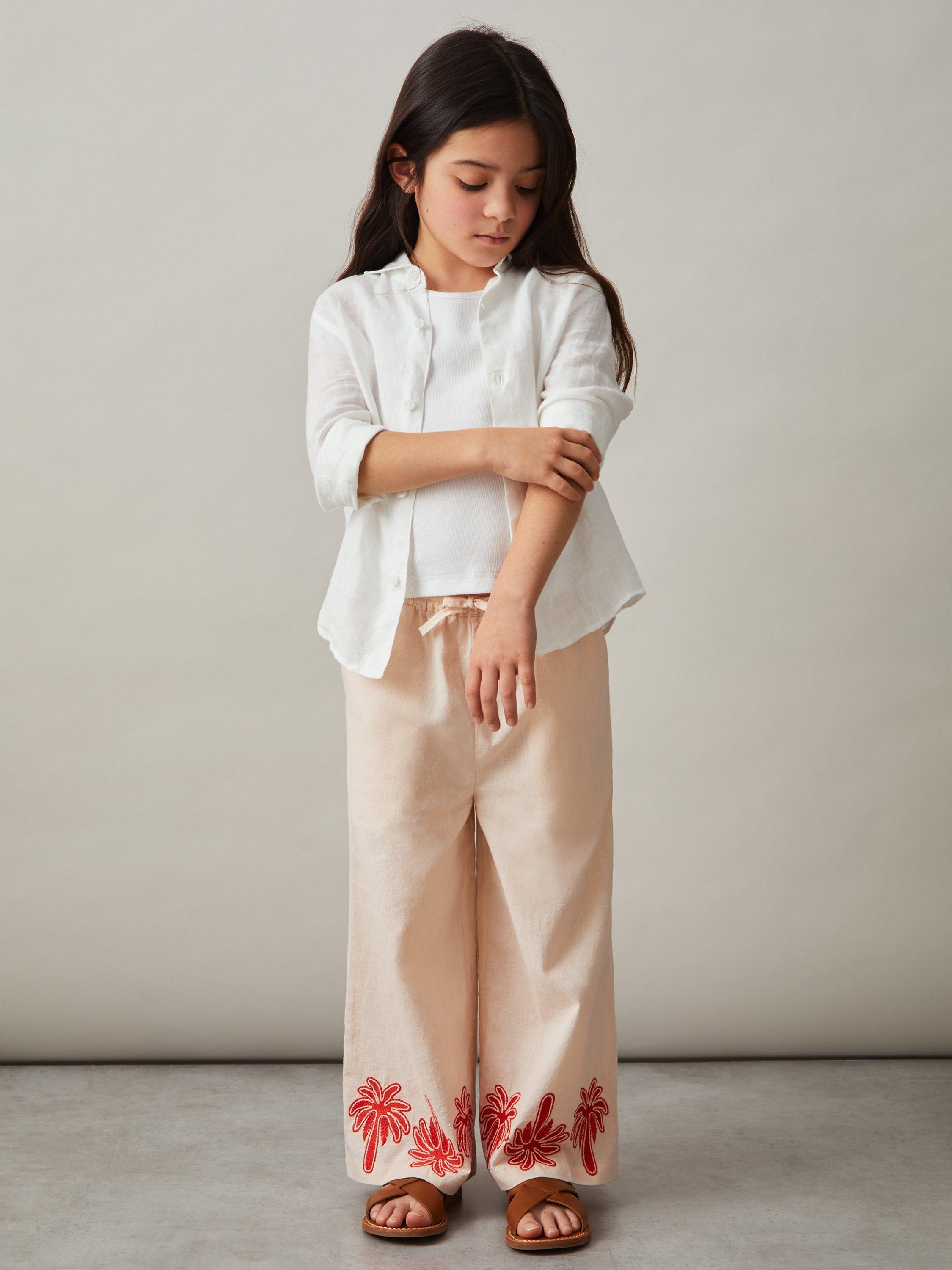 Product image 1 of 4, which shows Reiss Kids' Cate Linen Blend Palm Embroidery Trousers, Stone, 5-6 years