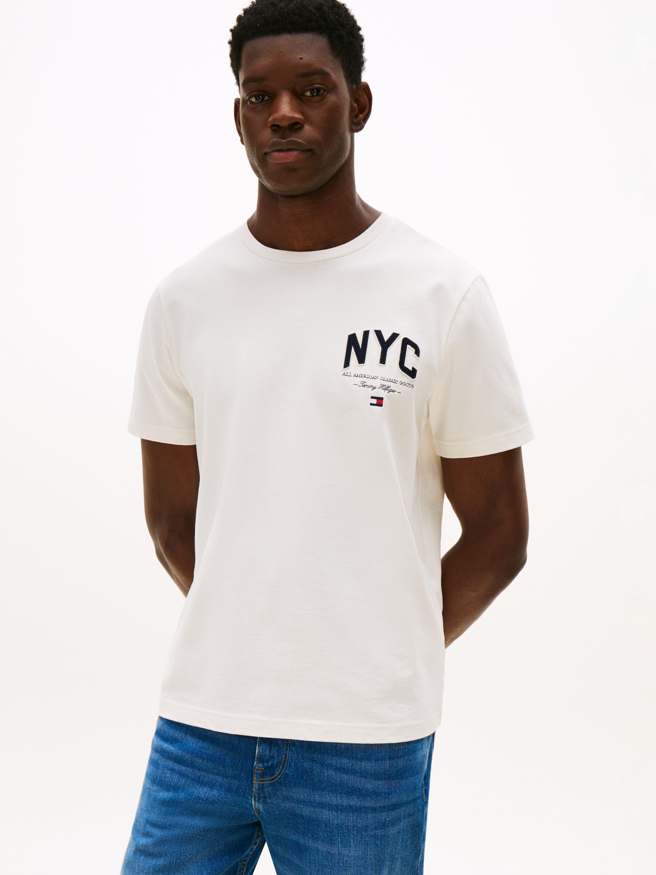 Product image 1 of 5, which shows Tommy Hilfiger Cotton Regular Fit Short Sleeve NYC T-Shirt, Ivory Petal, XXXL