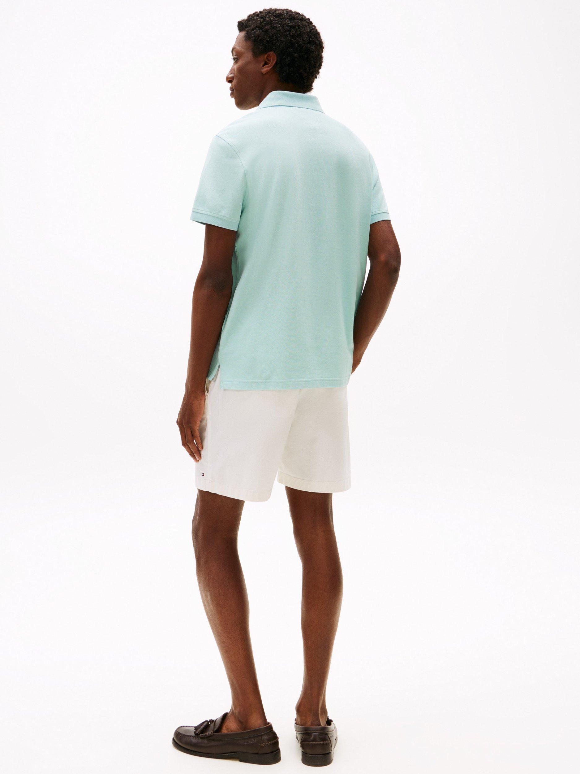Product image 2 of 5, which shows Tommy Hilfiger 1985 Regular Fit Polo Shirt, Light Blue, S