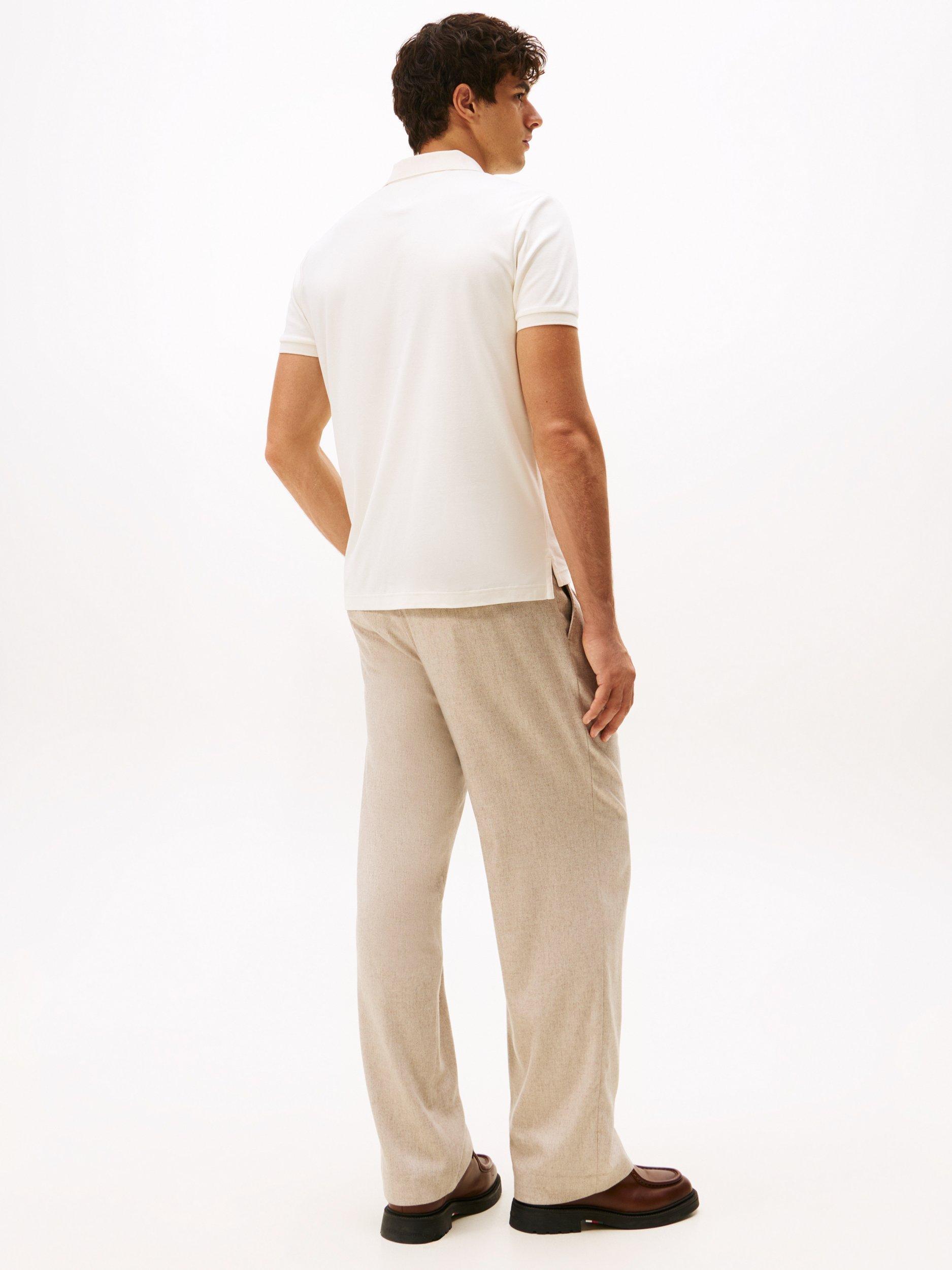 Product image 3 of 3, which shows Tommy Hilfiger Liquid Cotton Regular Fit Short Sleeve Polo Shirt, Ivory Petal, S