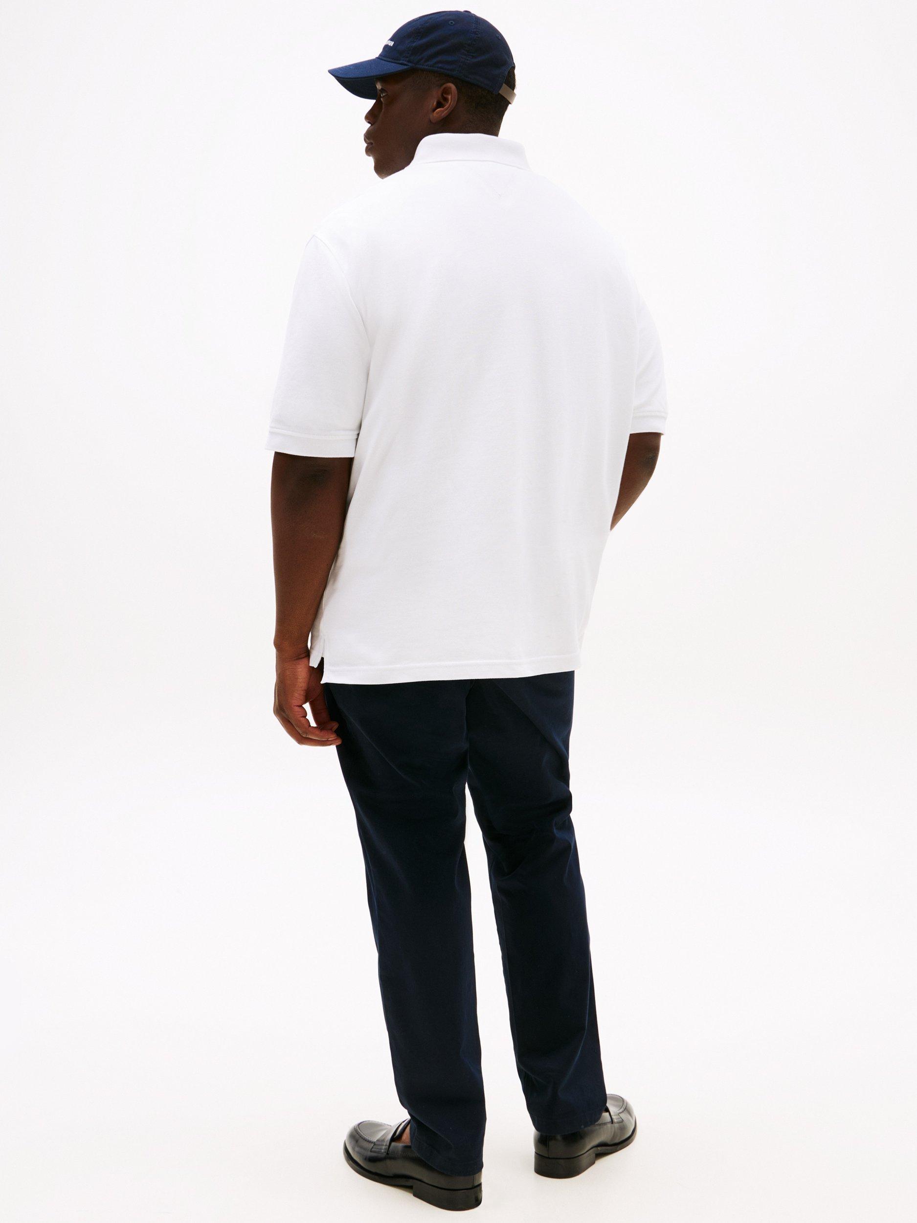 Product image 2 of 5, which shows Tommy Hilfiger Plus 1985 Cotton Blend Regular Fit Short Sleeve Polo Shirt, White, 4XL