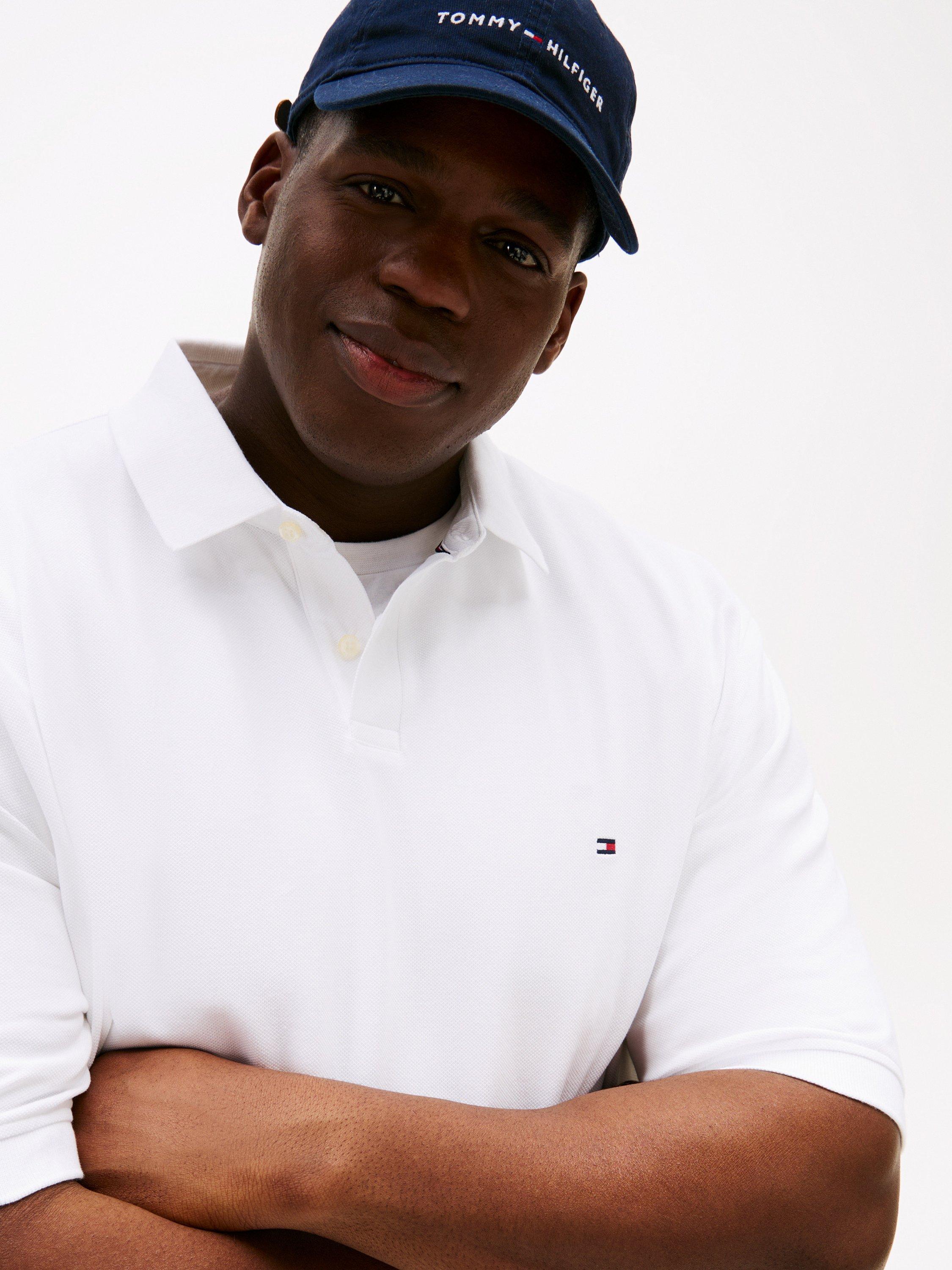 Product image 4 of 5, which shows Tommy Hilfiger Plus 1985 Cotton Blend Regular Fit Short Sleeve Polo Shirt, White, 4XL