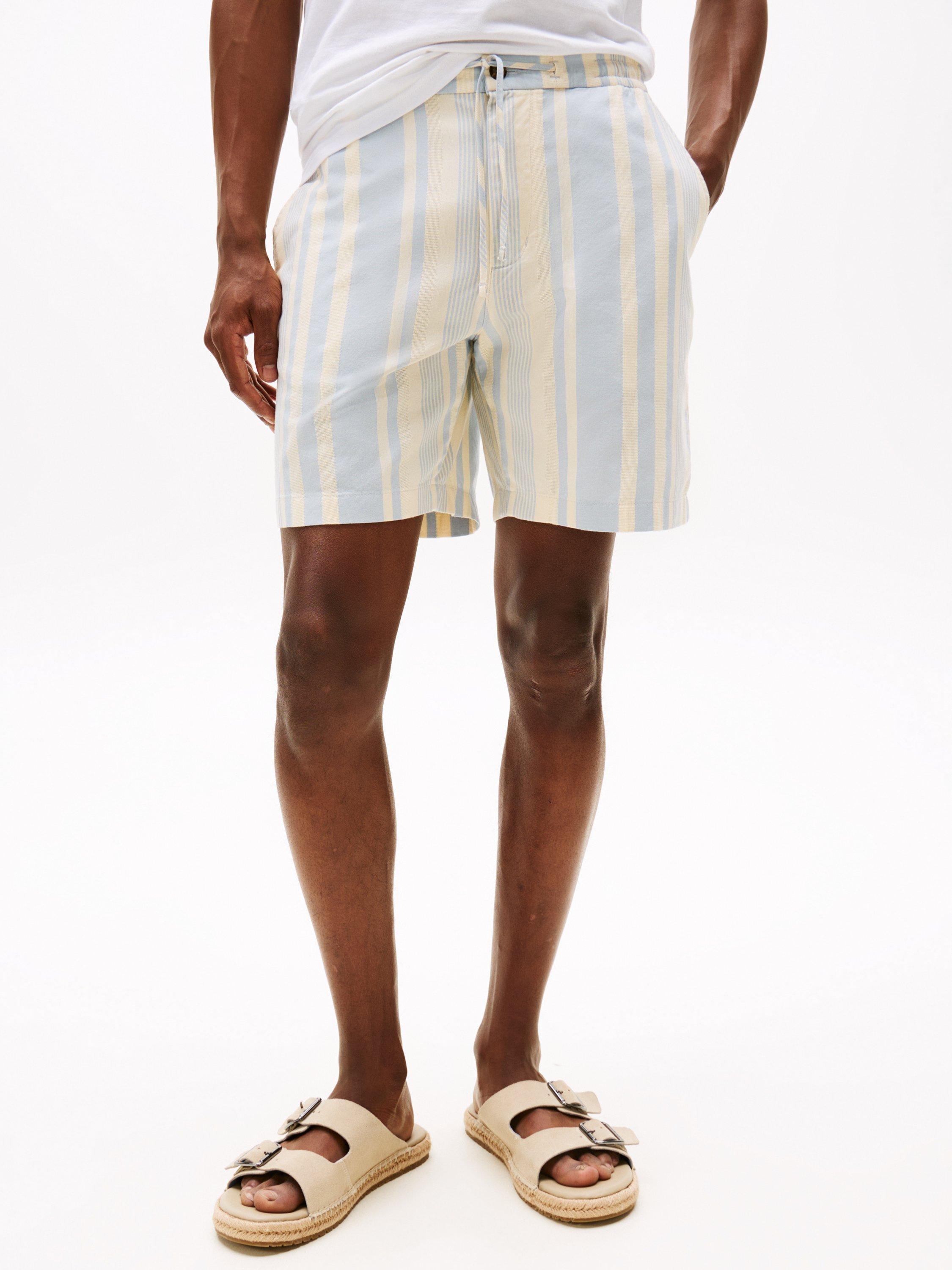Product image 1 of 4, which shows Tommy Hilfiger Mercer Striped Print Cotton Blend 7" Shorts, Breezy Blue/Ivory, 30R