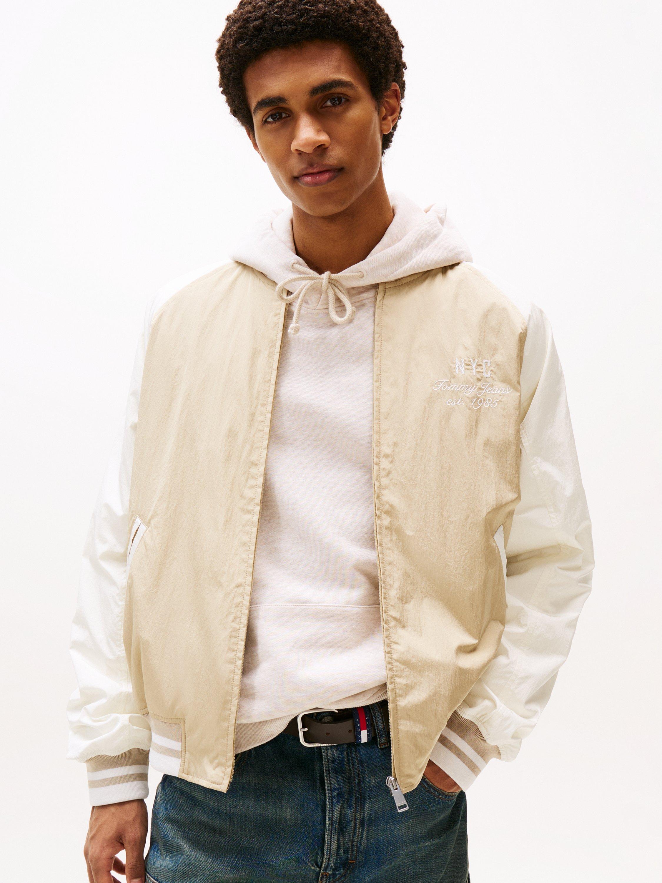 Product image 1 of 7, which shows Tommy Hilfiger Tommy Jeans Graphic Bomber Jacket, Silt/Ancient White, XS
