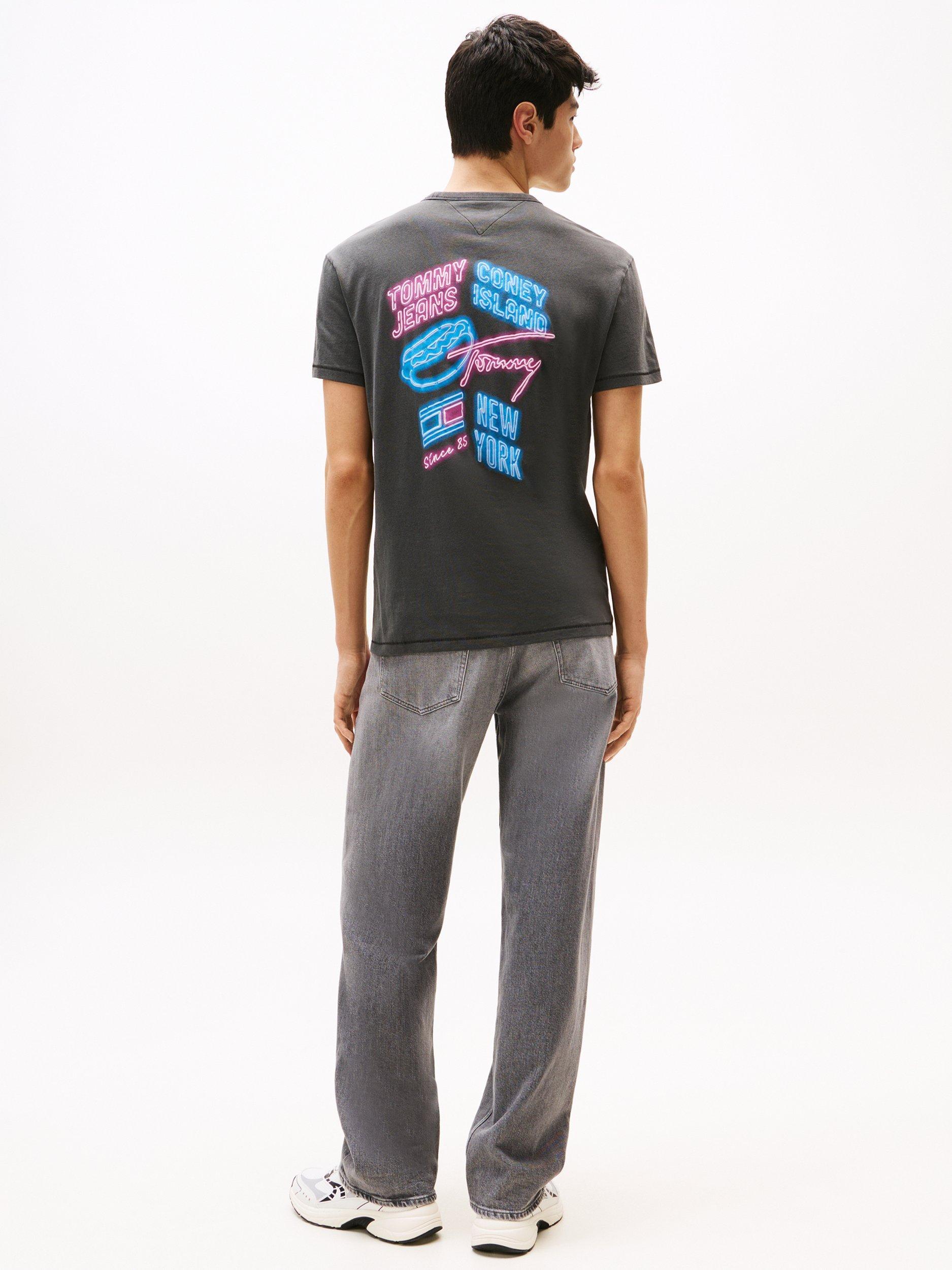 Product image 2 of 5, which shows Tommy Jeans Cotton Regular Fit Short Sleeve Graphic Logo T-Shirt, Black/Multi, XS