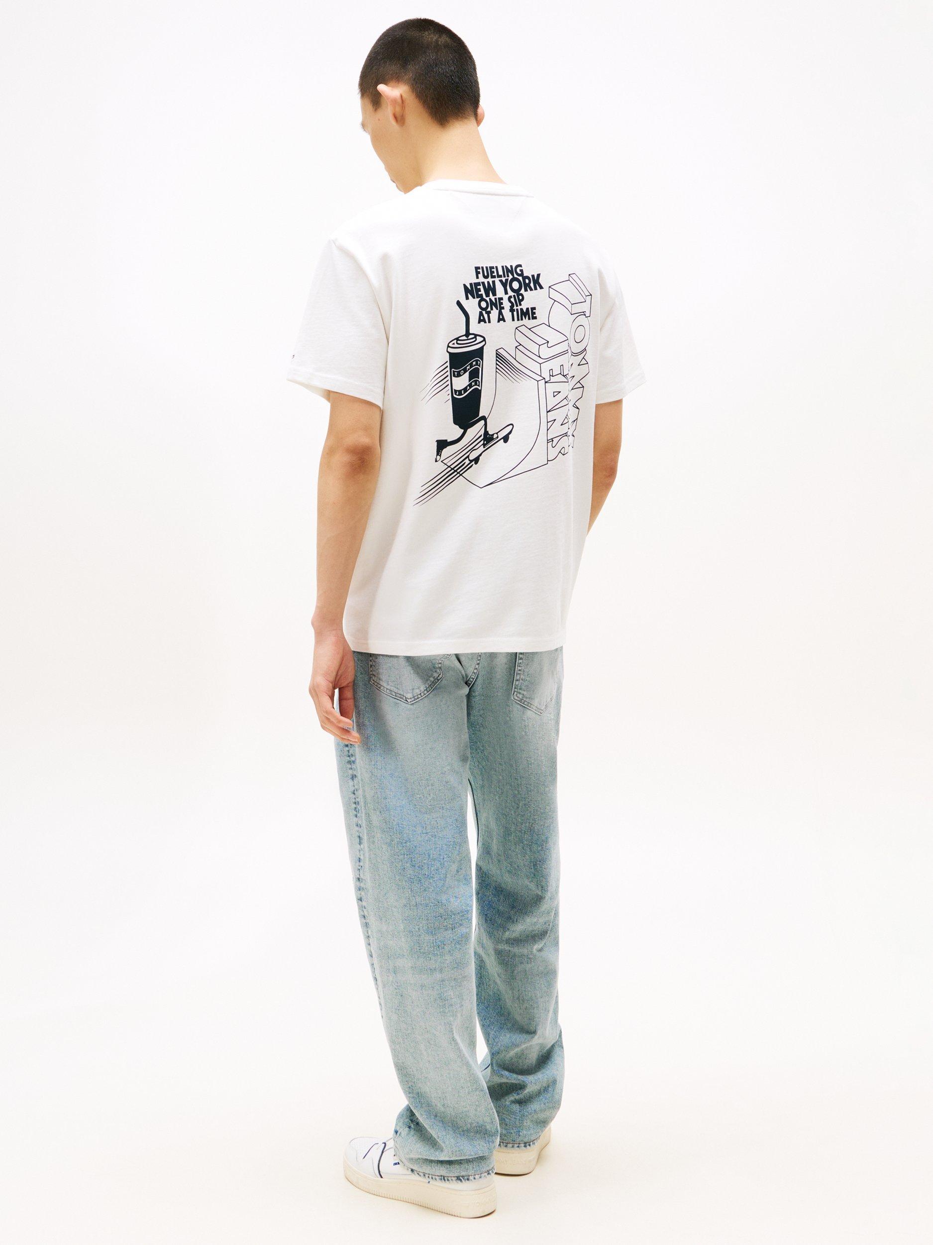 Product image 2 of 5, which shows Tommy Jeans Cotton  Fit Short Sleeve Skate Graphic T-Shirt, Natural/Multi, XS