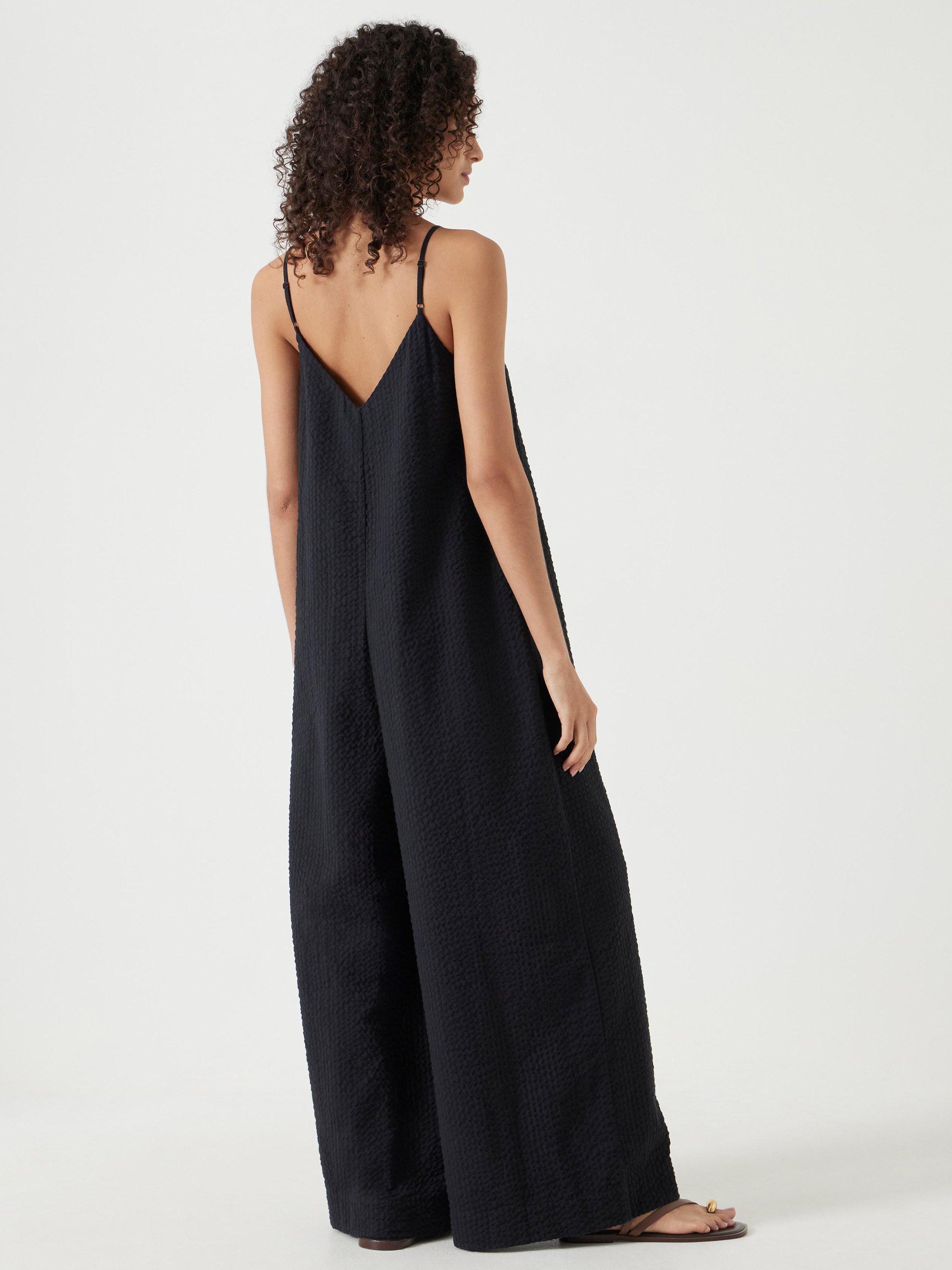 Product image 3 of 6, which shows HUSH Seersucker Cotton Flared Jumpsuit, Black, M