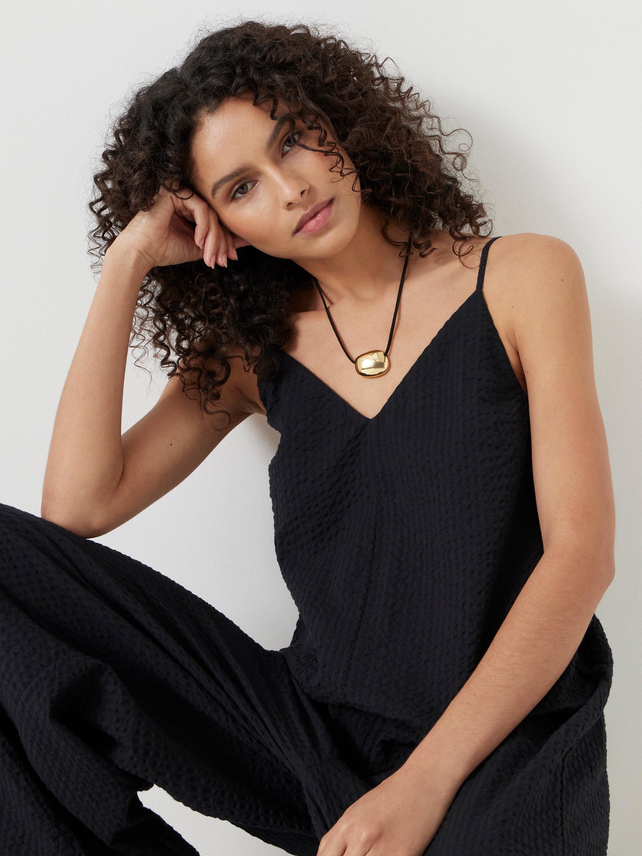 Product image 6 of 6, which shows HUSH Seersucker Cotton Flared Jumpsuit, Black, M