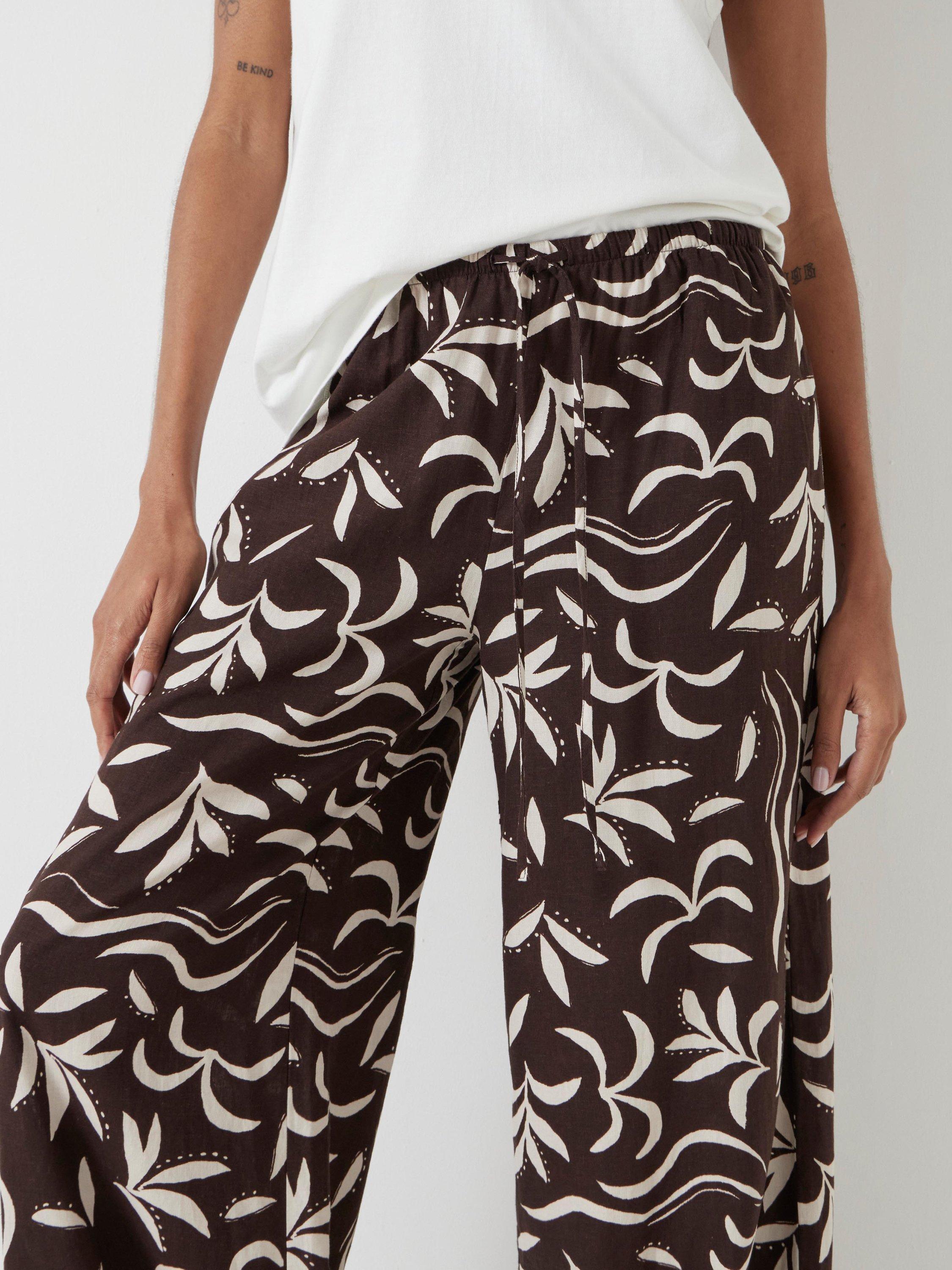Product image 3 of 6, which shows HUSH Palm Print Linen Rich Trousers, Chocolate/White, L