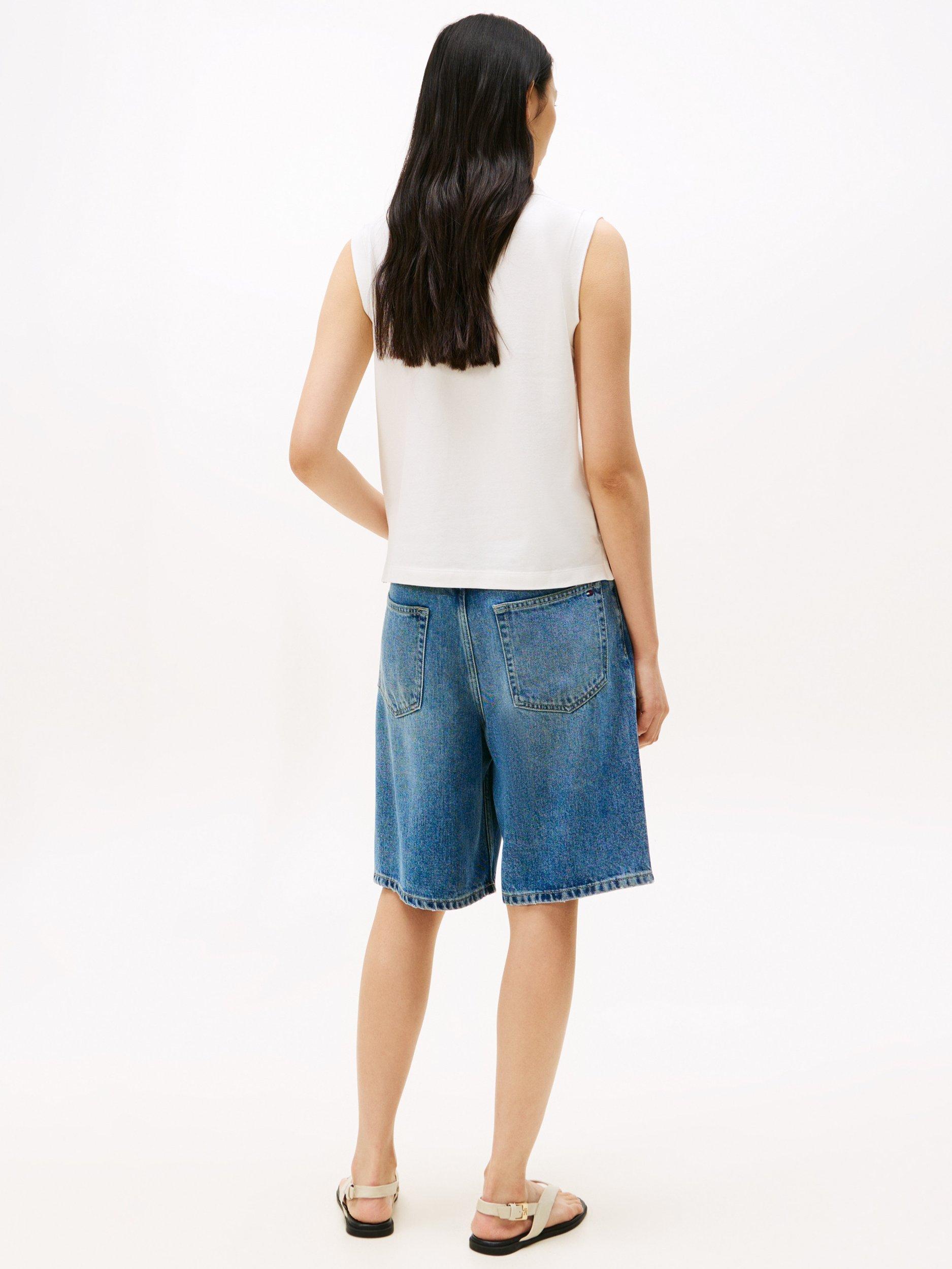 Product image 2 of 5, which shows Tommy Hilfiger Pique Relaxed Fit Sleeveless Polo Shirt, Optic White, S