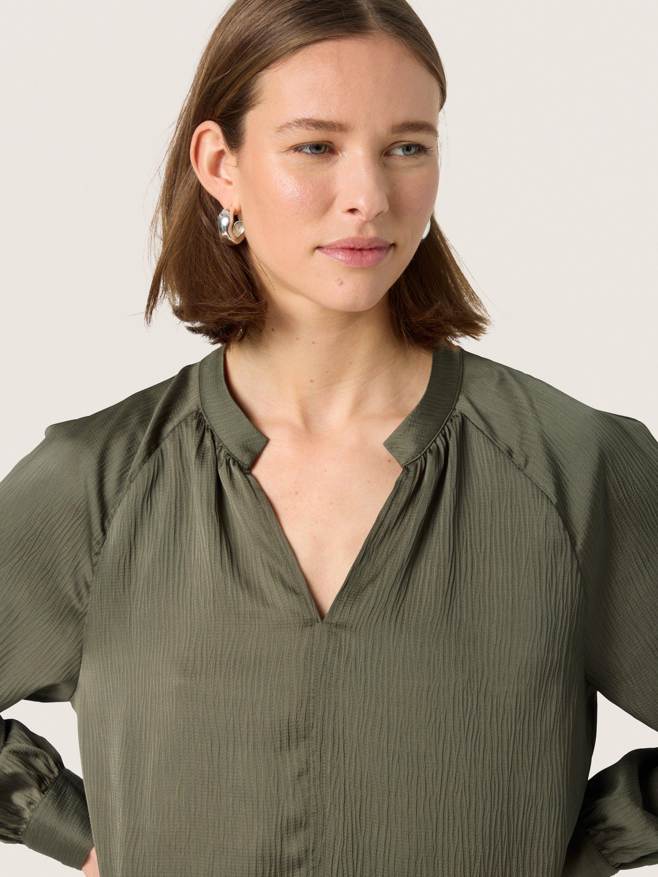 Product image 4 of 6, which shows Soaked In Luxury Ioana Relaxed V-Neck Blouse, Grape Leaf, XS