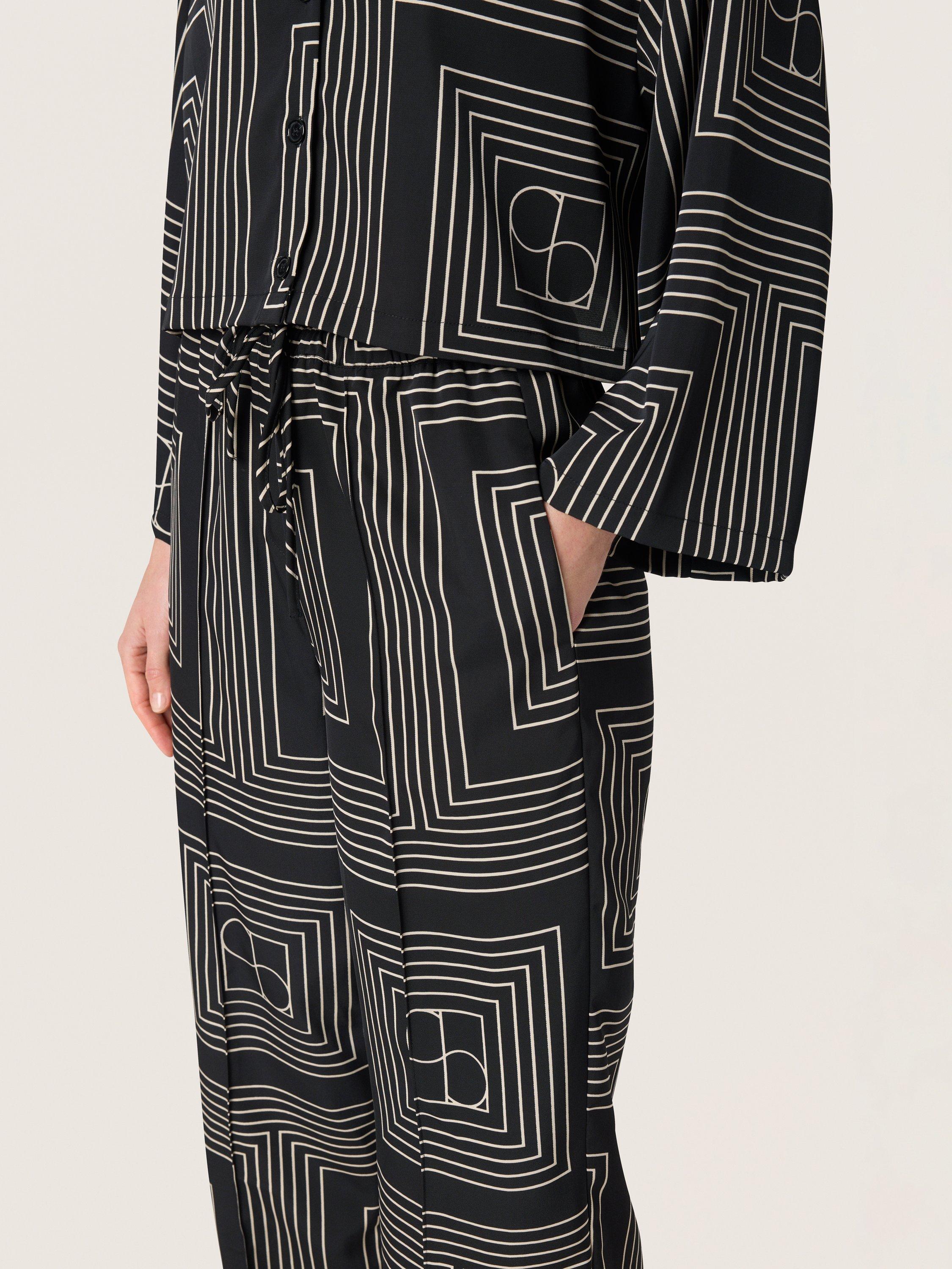 Product image 4 of 6, which shows Soaked In Luxury Topaz Faustina Trousers, Black/Multi, XS