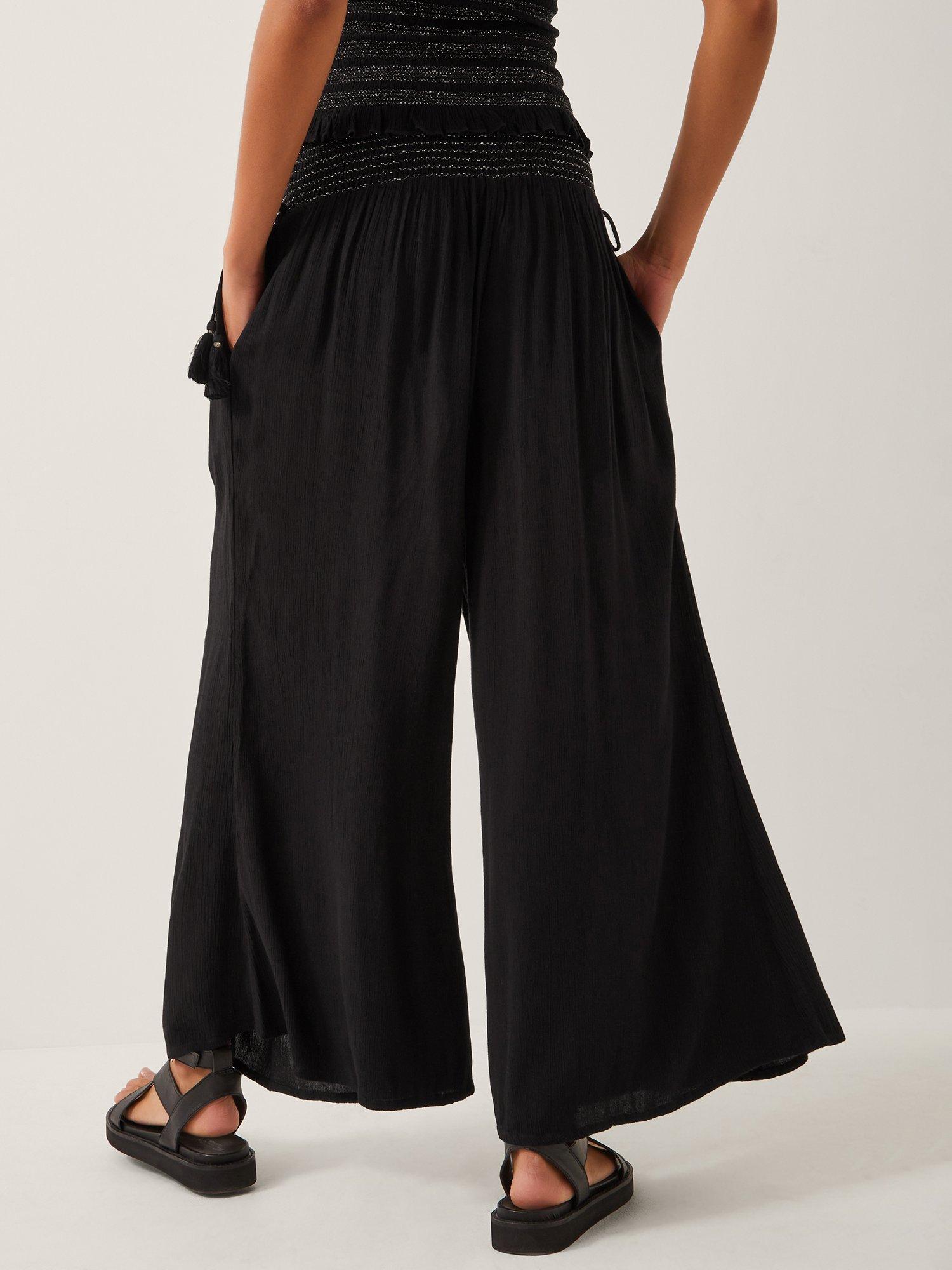 Product image 2 of 5, which shows Monsoon Heidi Tassel Wide Leg Trousers, Black, S