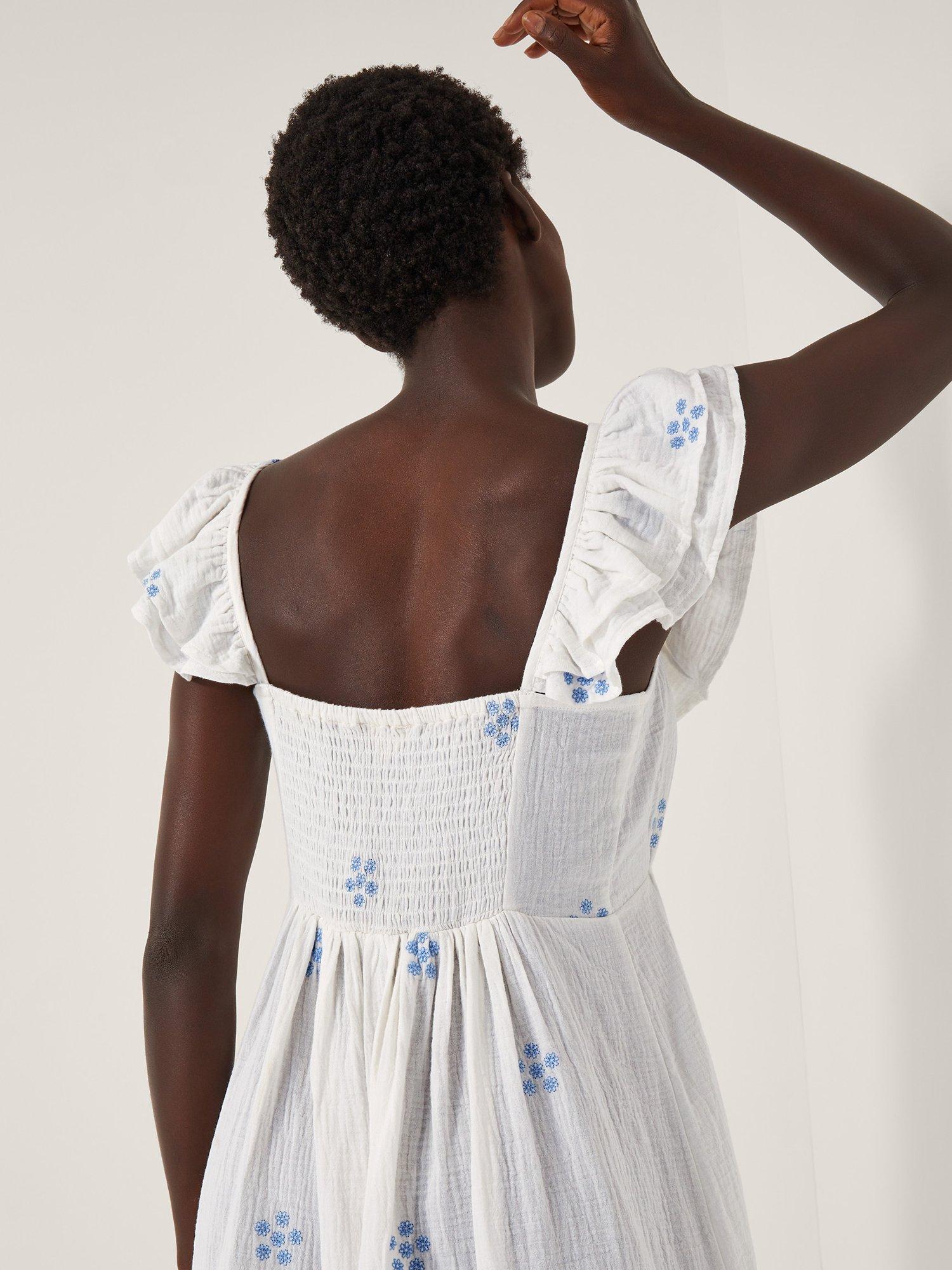 Product image 4 of 5, which shows Monsoon Daisy Cotton Midi Dress, White, S