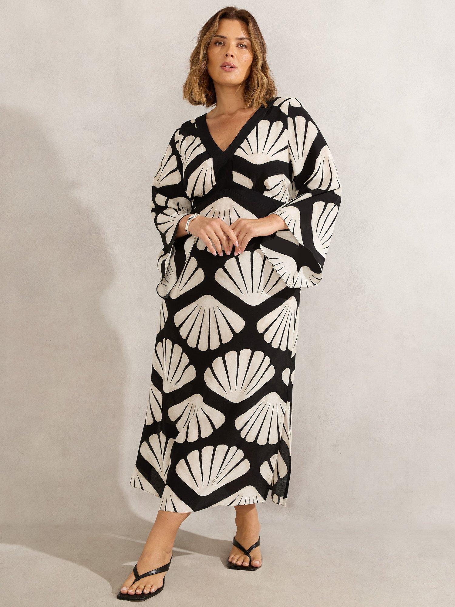 Product image 1 of 3, which shows Live Unlimited Shell Print Flared Sleeve Maxi Dress, Black/Multi, 12