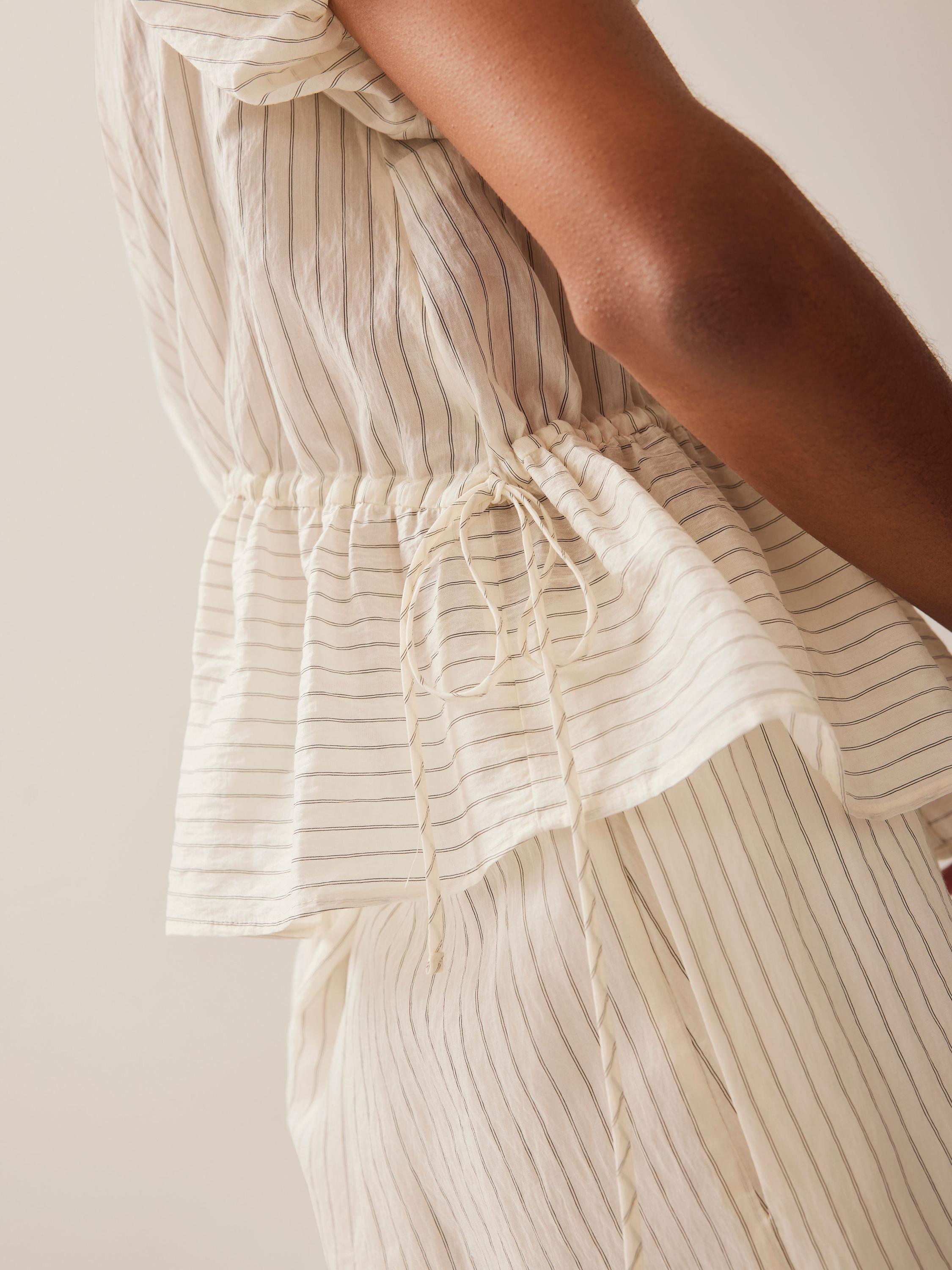 Product image 5 of 8, which shows Mint Velvet Neutral Stripe Puff Sleeve Peplum Top, Cream, XL