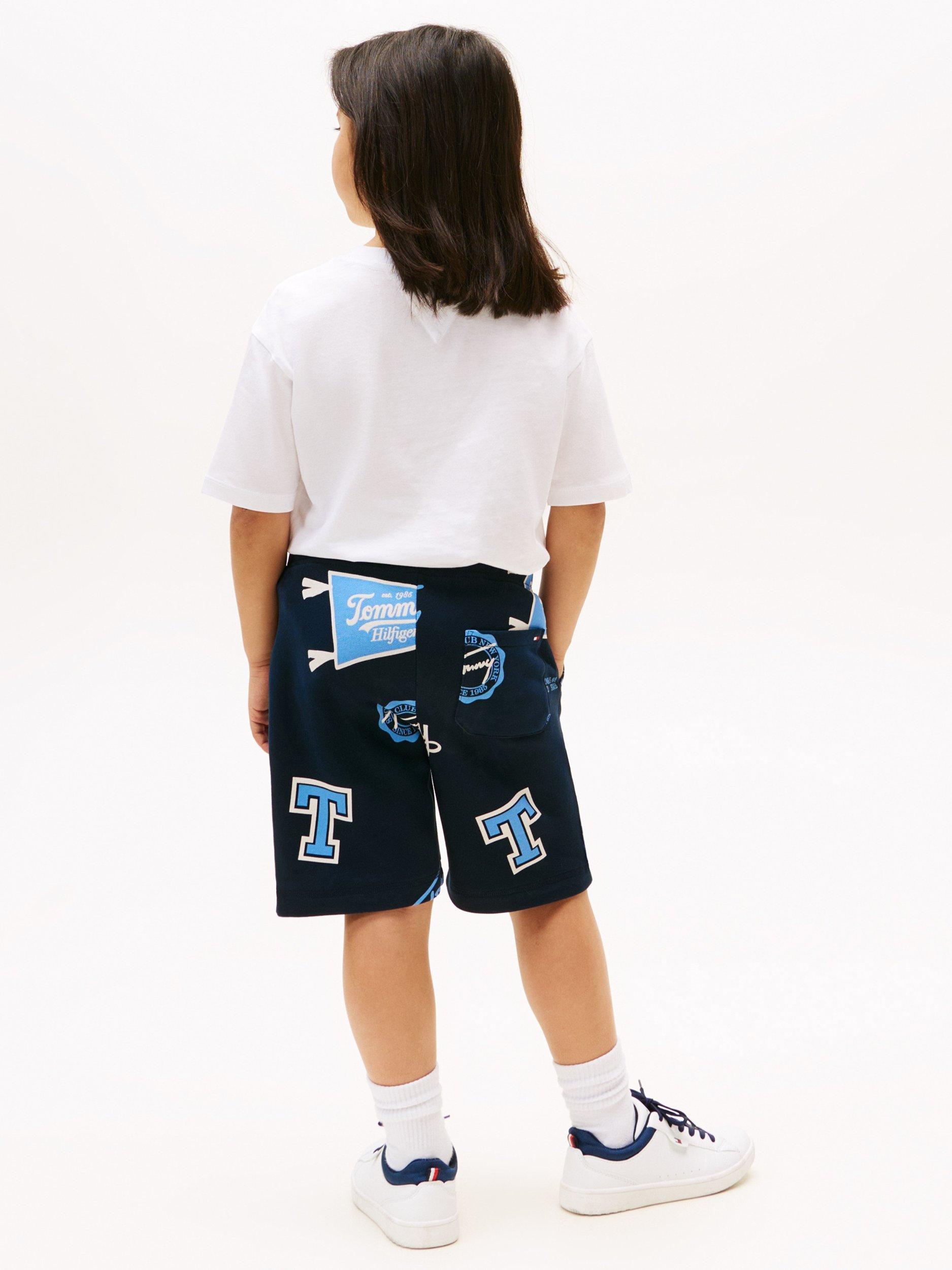 Product image 2 of 5, which shows Tommy Hilfiger Kids' Cotton Blend Drawstring Varsity Shorts, Dark Night Navy, 3 years