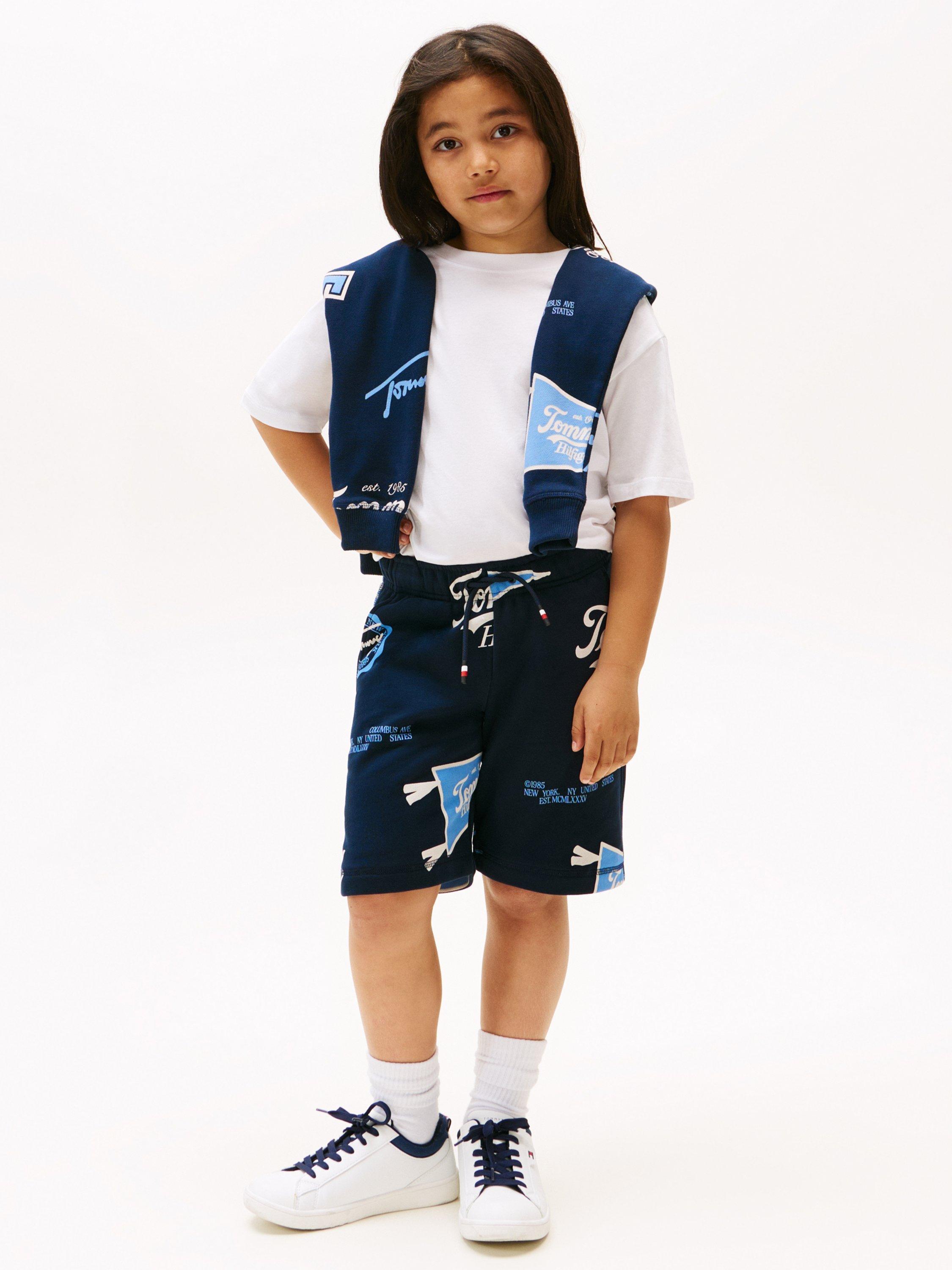 Product image 3 of 5, which shows Tommy Hilfiger Kids' Cotton Blend Drawstring Varsity Shorts, Dark Night Navy, 3 years