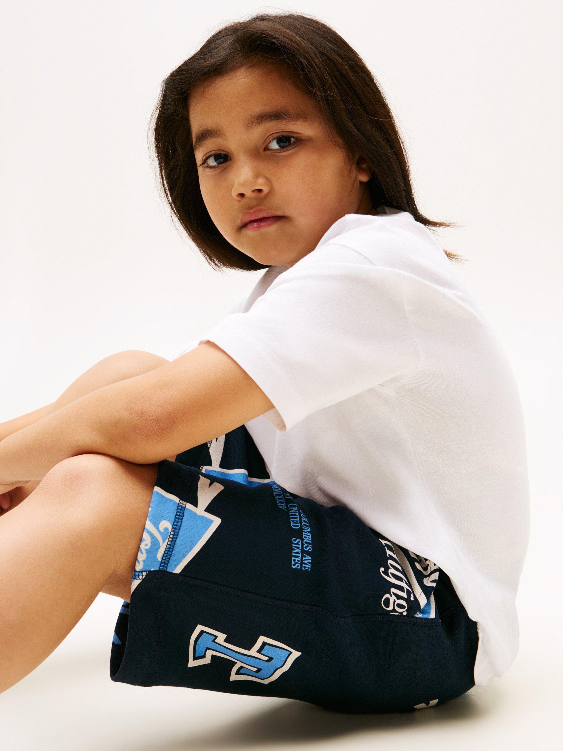 Product image 4 of 5, which shows Tommy Hilfiger Kids' Cotton Blend Drawstring Varsity Shorts, Dark Night Navy, 3 years