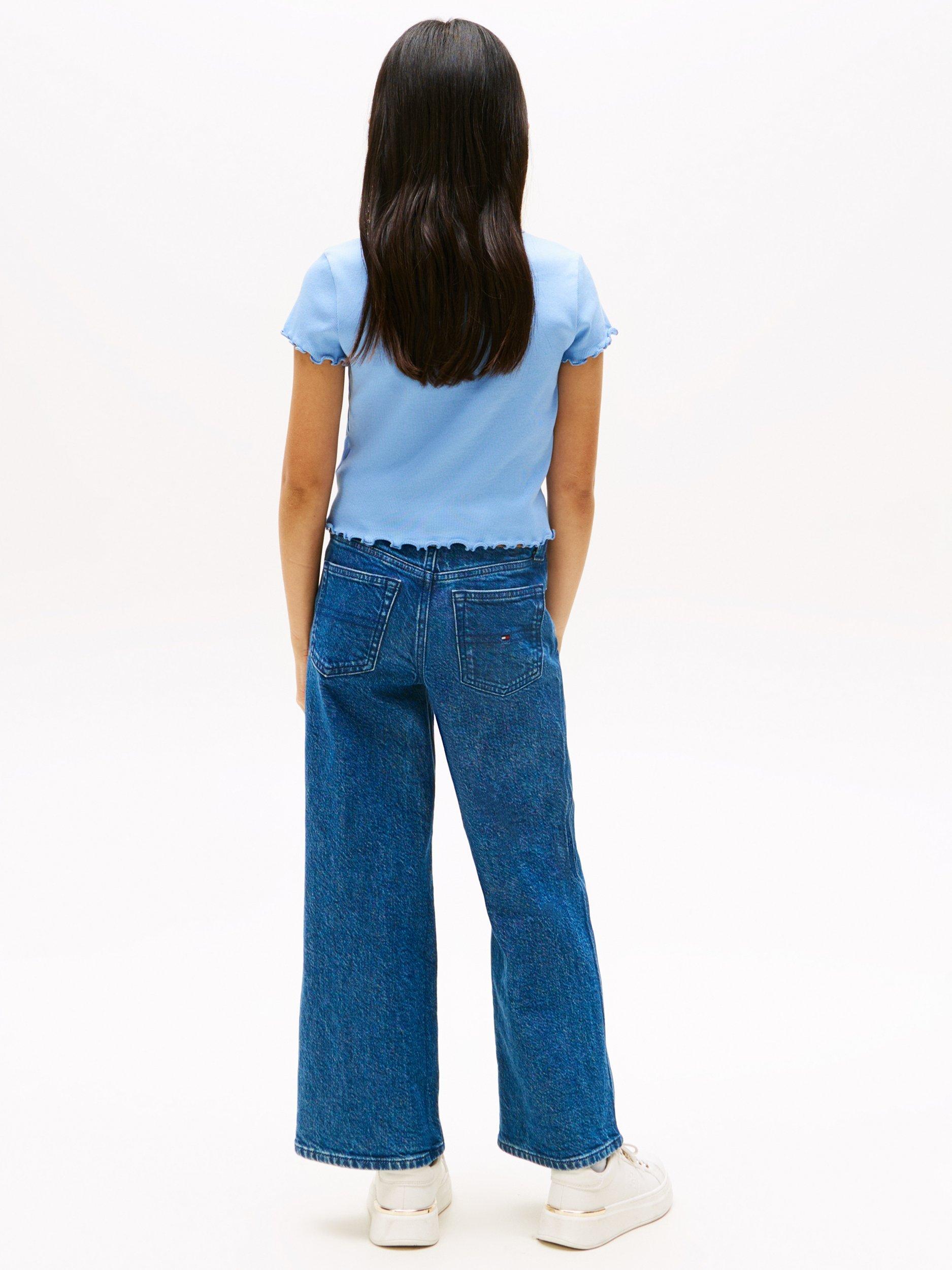 Product image 2 of 5, which shows Tommy Hilfiger Kids' Cotton Short Sleeved Ruffle T-shirt, Cloudy Blue, 3 years
