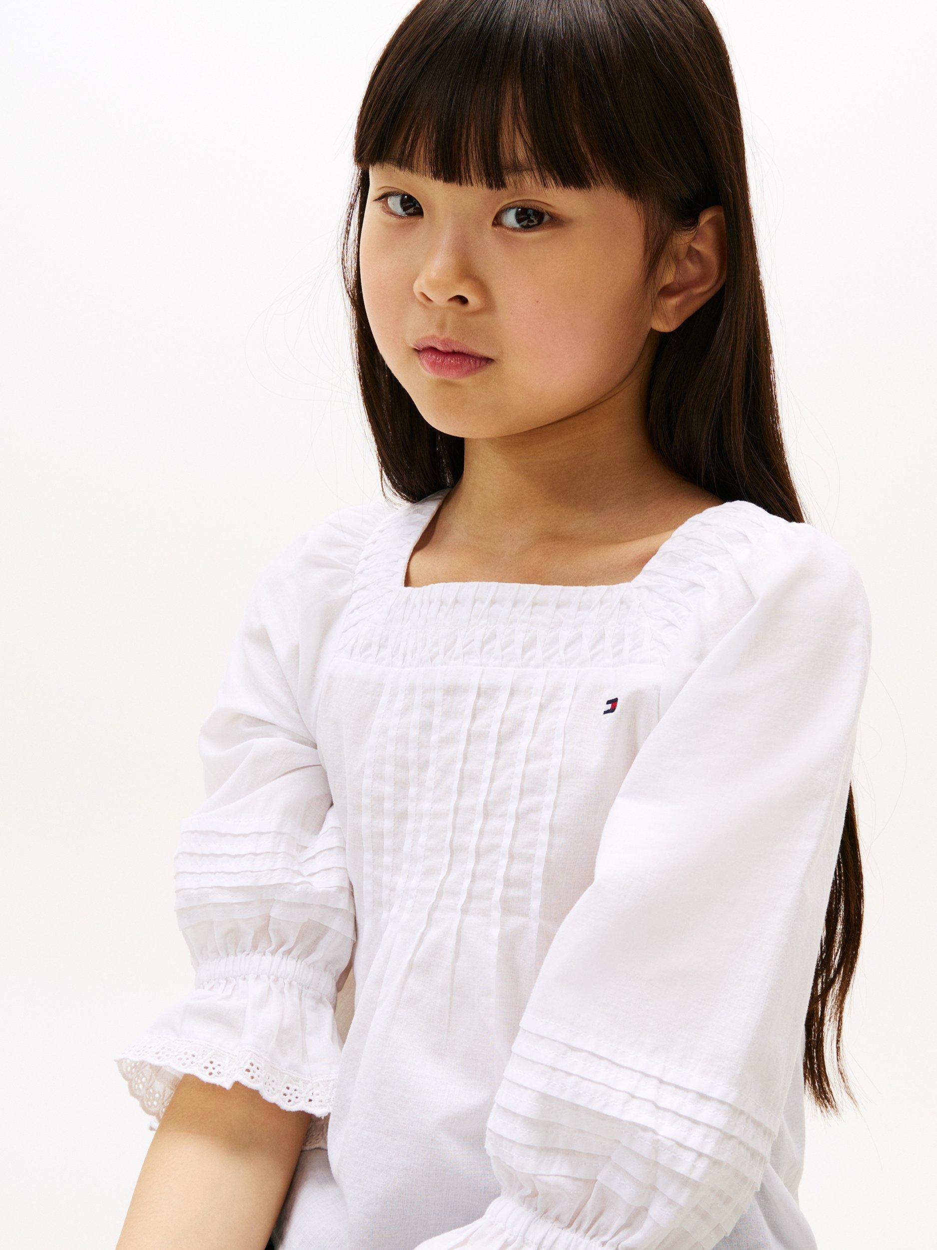 Product image 4 of 5, which shows Tommy Hilfiger Kids' Cotton Broderie Long Sleeved Pintuck Blouse, White, 3 years