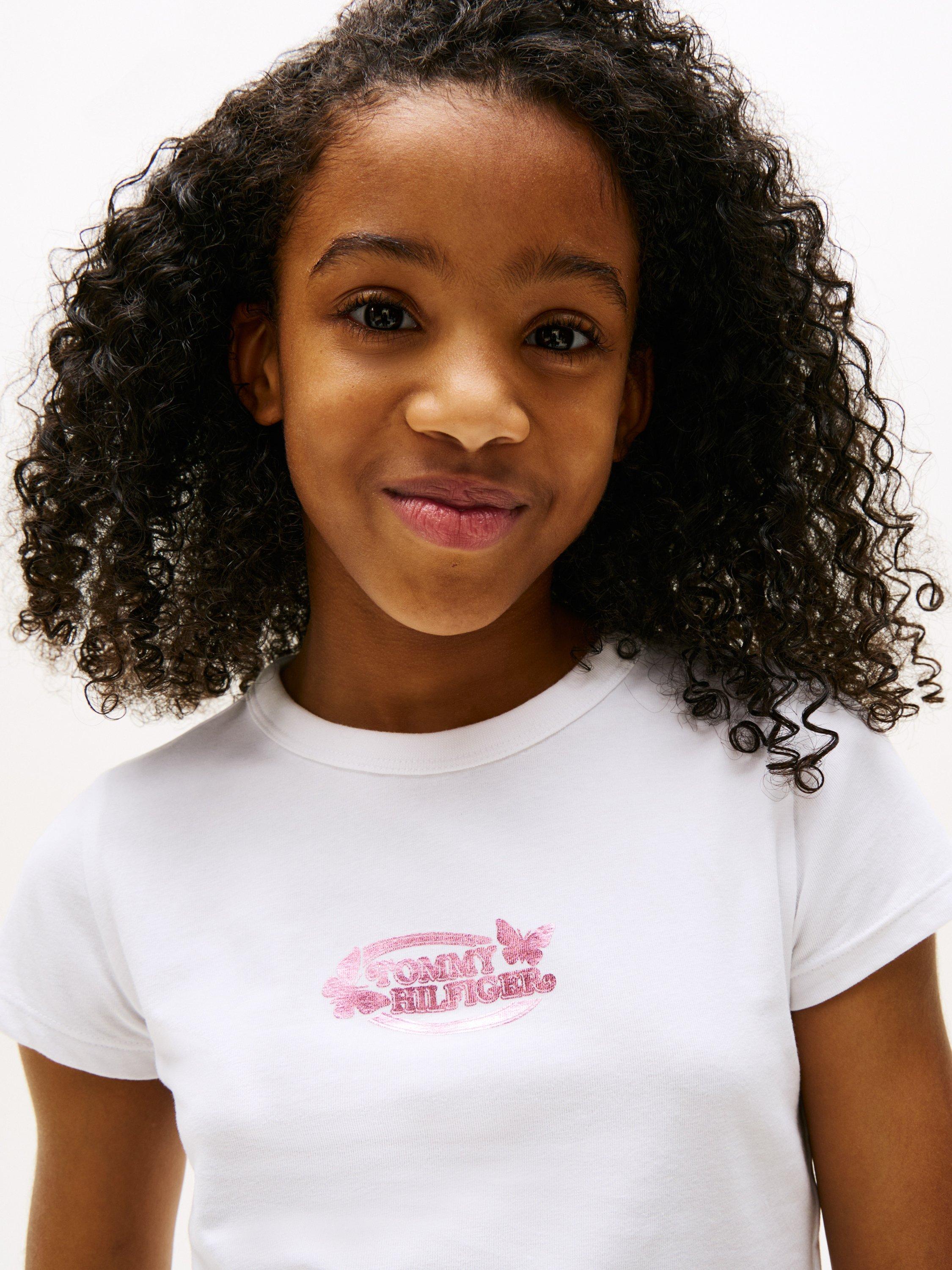 Product image 4 of 5, which shows Tommy Hilfiger Kid's Cotton Slim Fit Butterfly Logo T-Shirt, White, 3 years