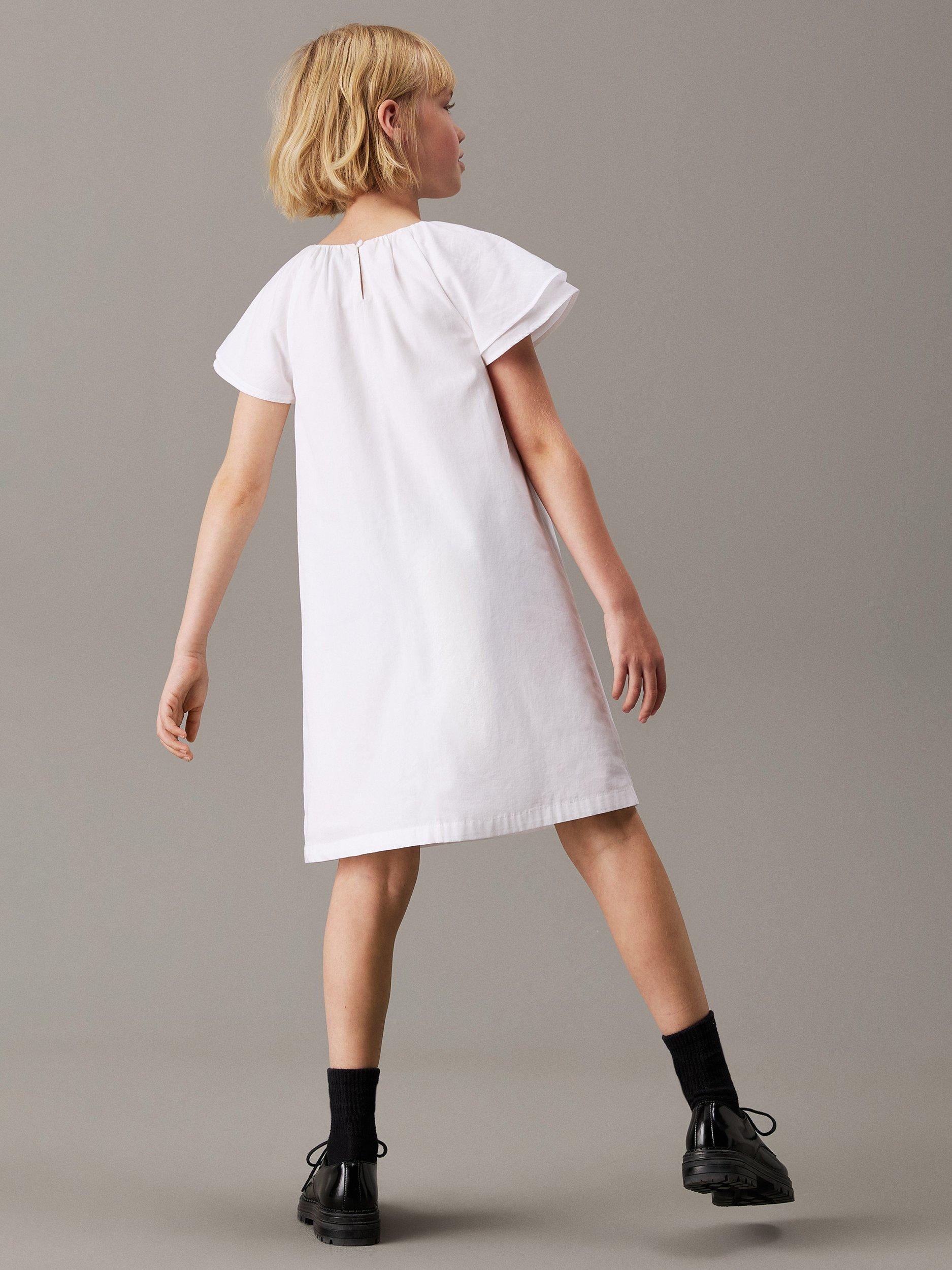 Product image 2 of 4, which shows Calvin Klein Kids' Poplin Frilled Sleeve Dress, Bright White, 8 years