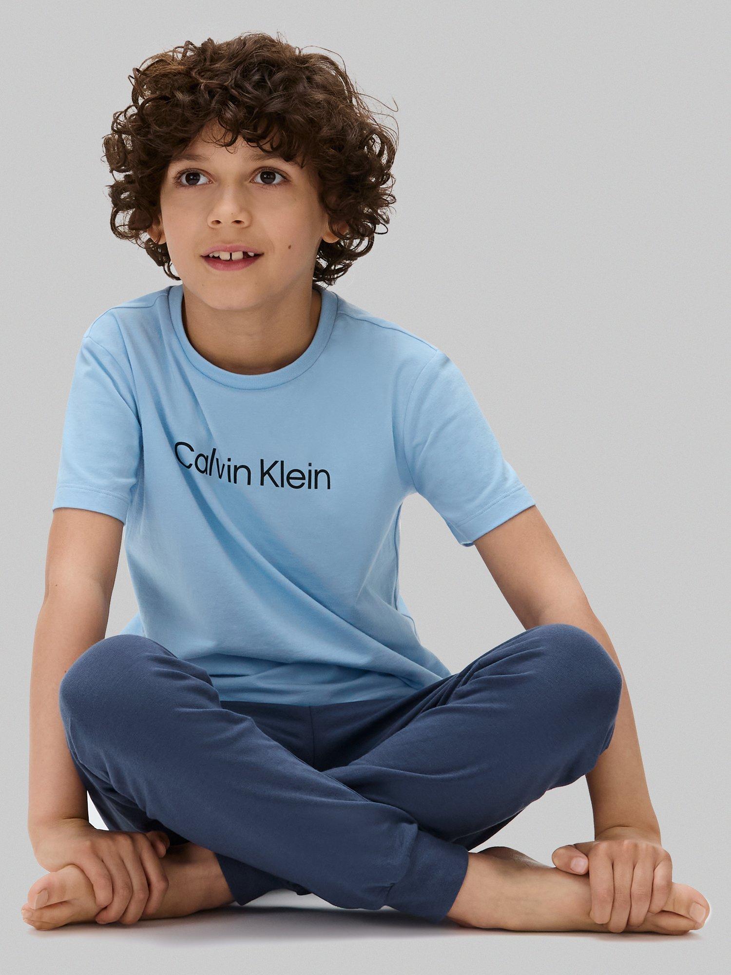 Product image 5 of 6, which shows Calvin Klein Kids' Cotton T-Shirt and Joggers Pyjama Set, Oceana/W/Bluebell, 8-10 years