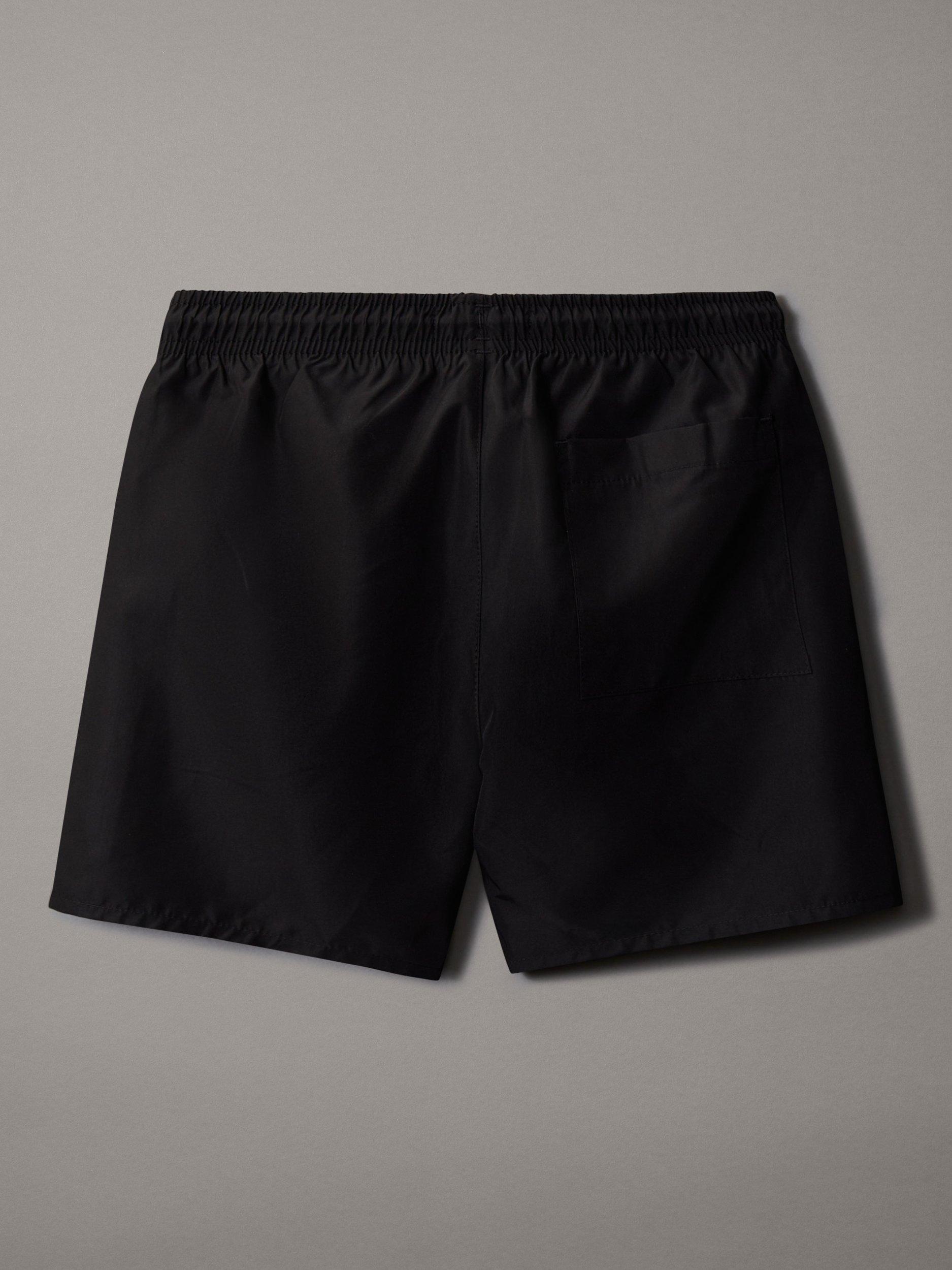 Product image 2 of 2, which shows Calvin Klein Kids' Intense Power Swim Shorts, Pvh Black, 8 yrs
