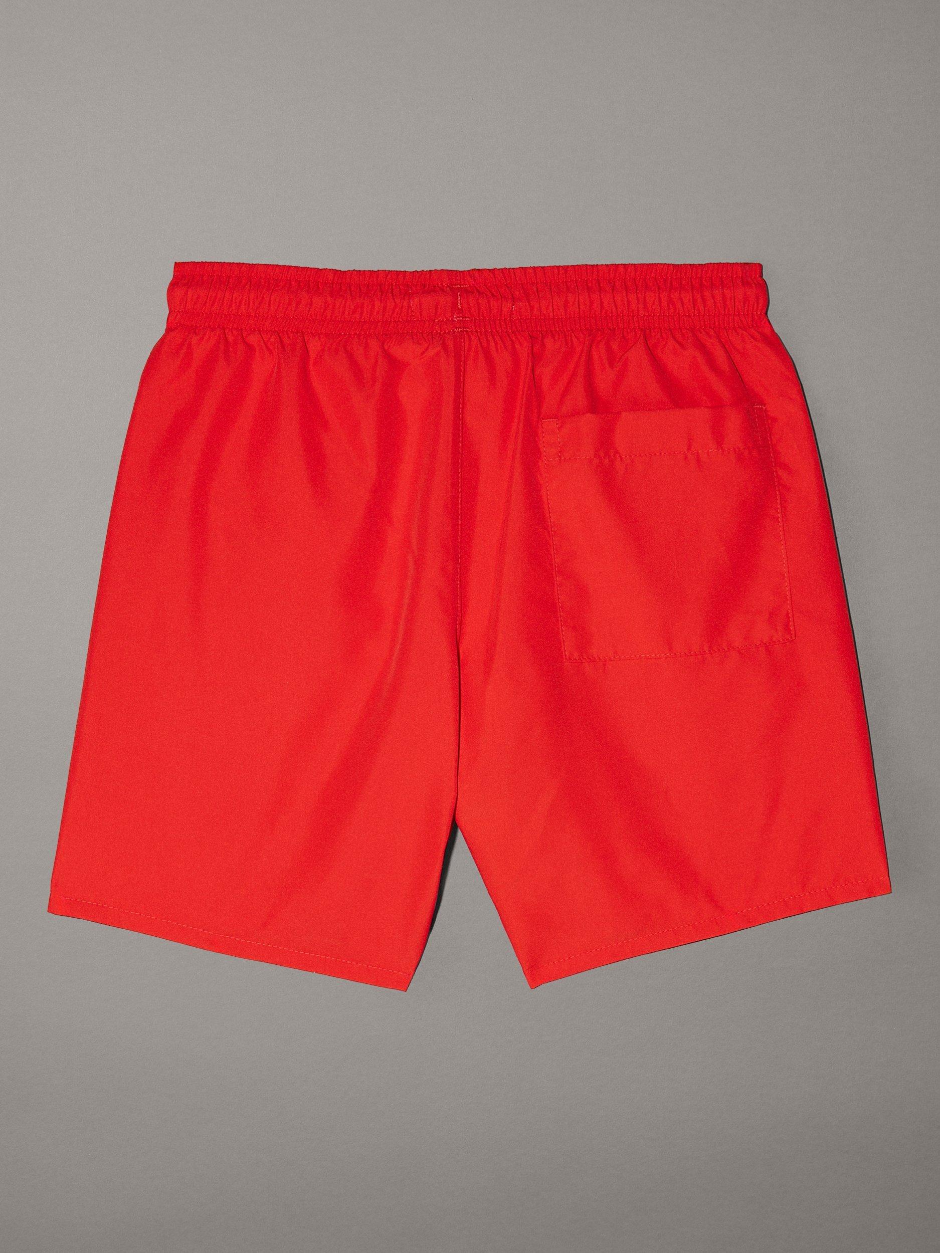 Product image 2 of 2, which shows Calvin Klein Kids' Intense Power Swim Shorts, Flaming Chili, 8 years