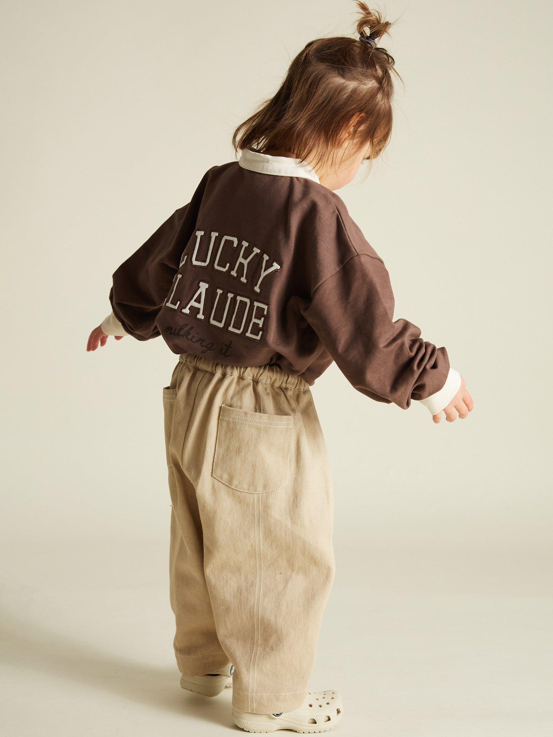 Product image 2 of 4, which shows Claude & Co Kids' Sacha Relaxed Trousers, Sand, 4-5 years